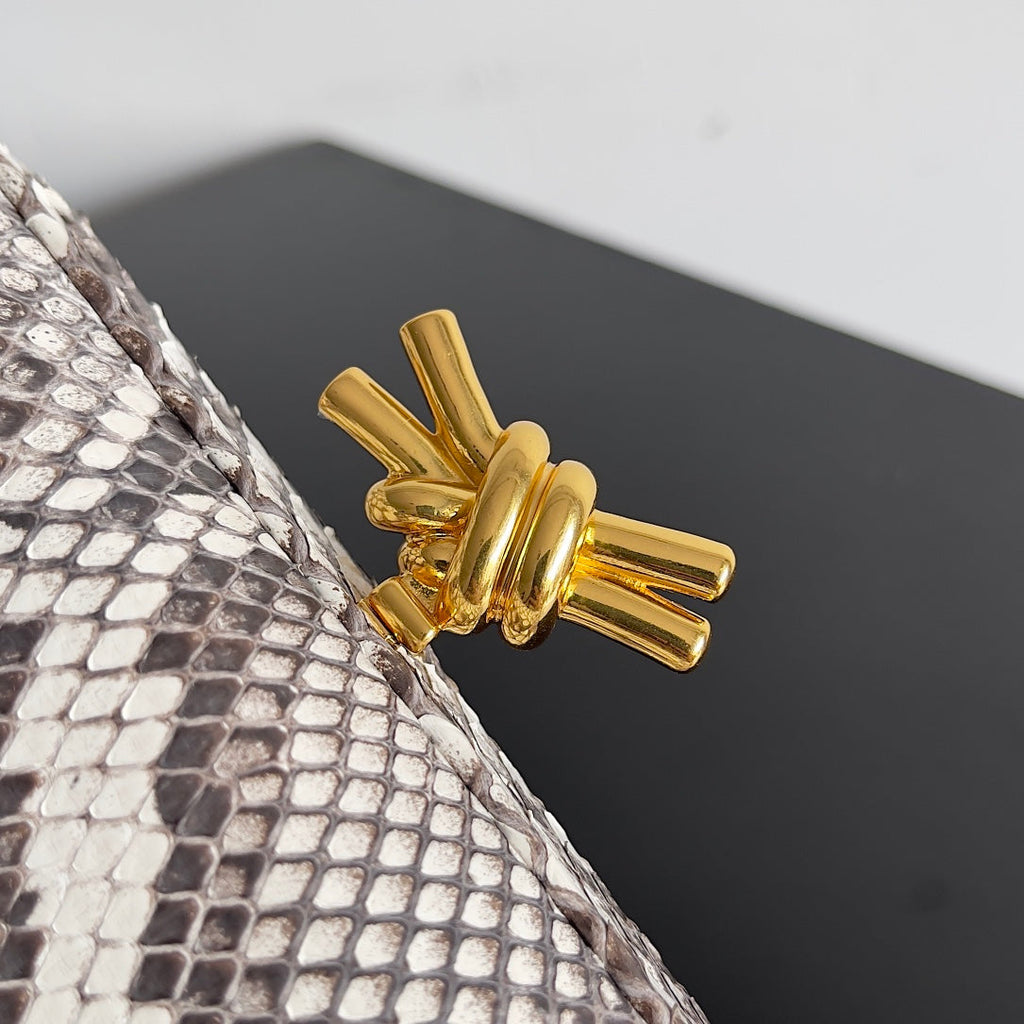 KNOT CHAIN CLUTCH 20.5 IN SNAKE PATTERN CALFSKIN