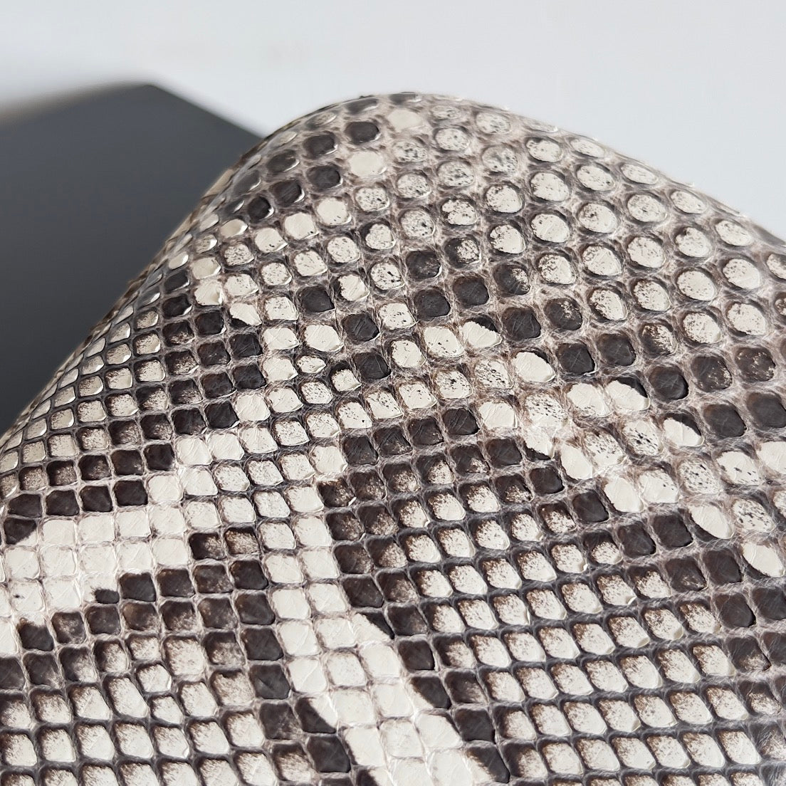 KNOT CHAIN CLUTCH 20.5 IN SNAKE PATTERN CALFSKIN