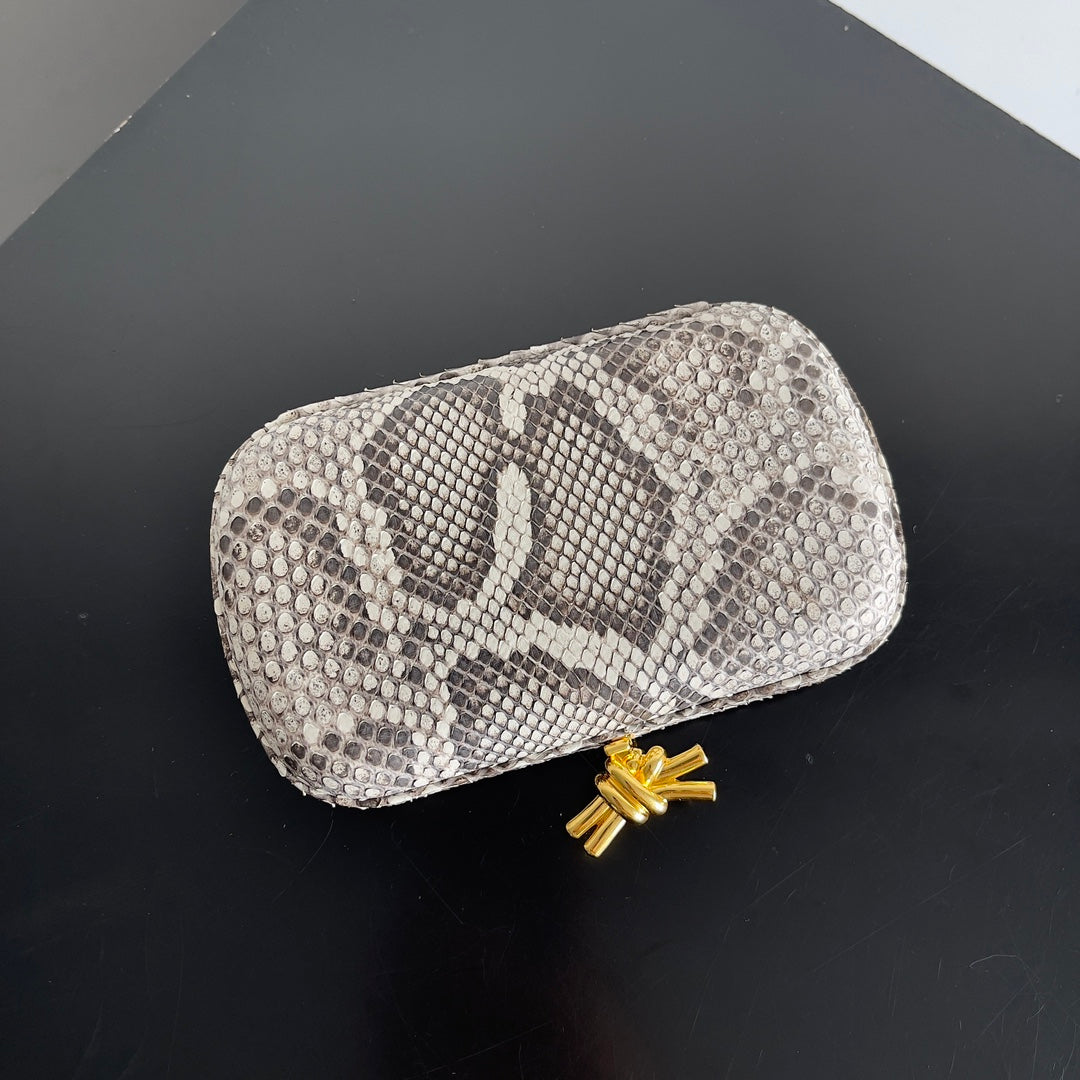 KNOT CHAIN CLUTCH 20.5 IN SNAKE PATTERN CALFSKIN