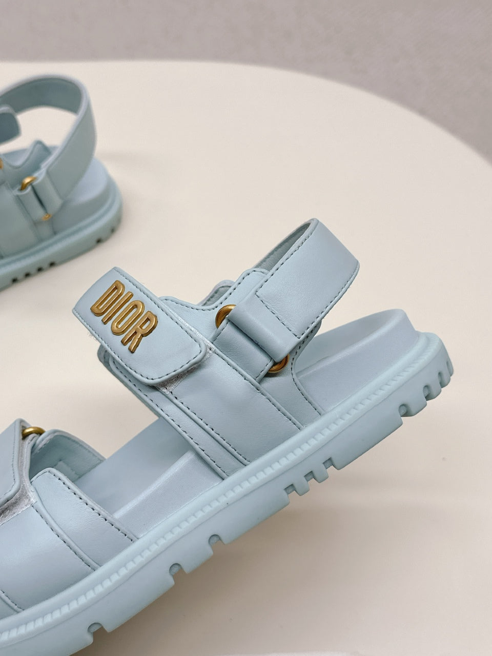 DIOR BACK-STRAP SANDALS 25S IN PASTEL BLUE CALFSKIN WITH GOLD HARDWARE