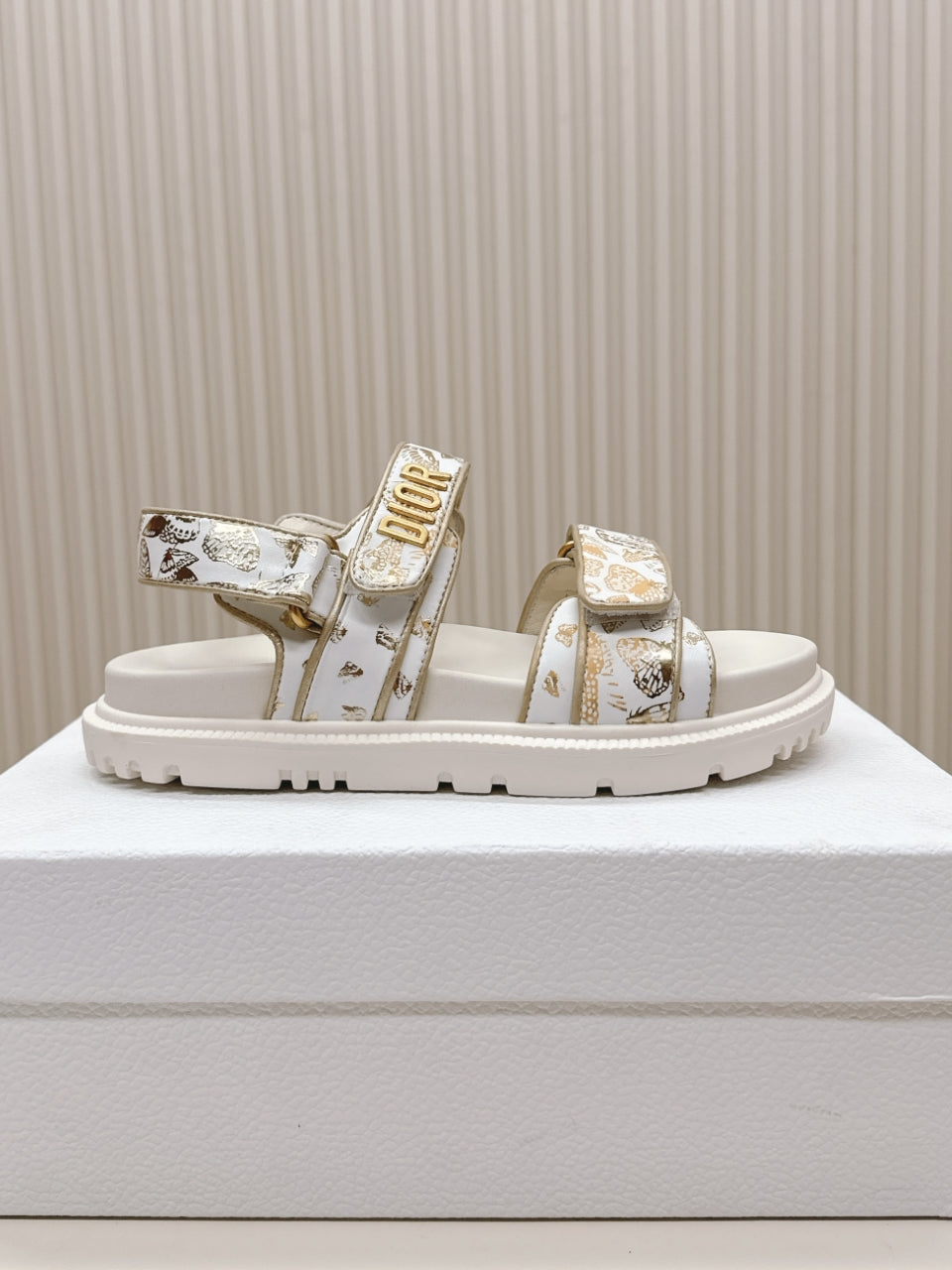 DIOR BACK-STRAP SANDALS 25S IN CREAM WHITE AND GOLD CALFSKIN WITH BUTTERFLY MOTIF