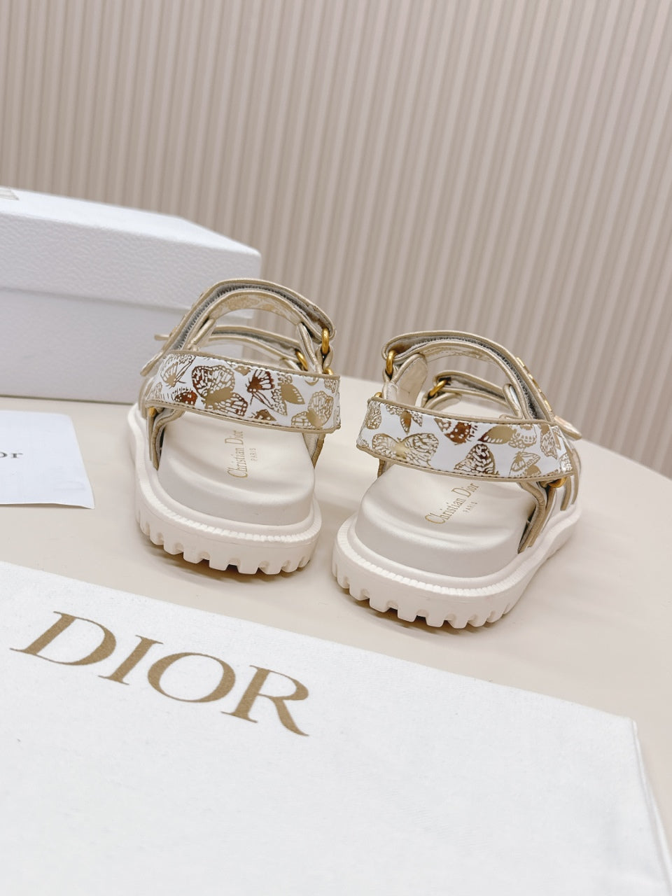 DIOR BACK-STRAP SANDALS 25S IN CREAM WHITE AND GOLD CALFSKIN WITH BUTTERFLY MOTIF