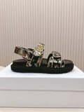 DIOR BACK-STRAP SANDALS 25S IN BLACK AND GOLD CALFSKIN WITH BUTTERFLY MOTIF