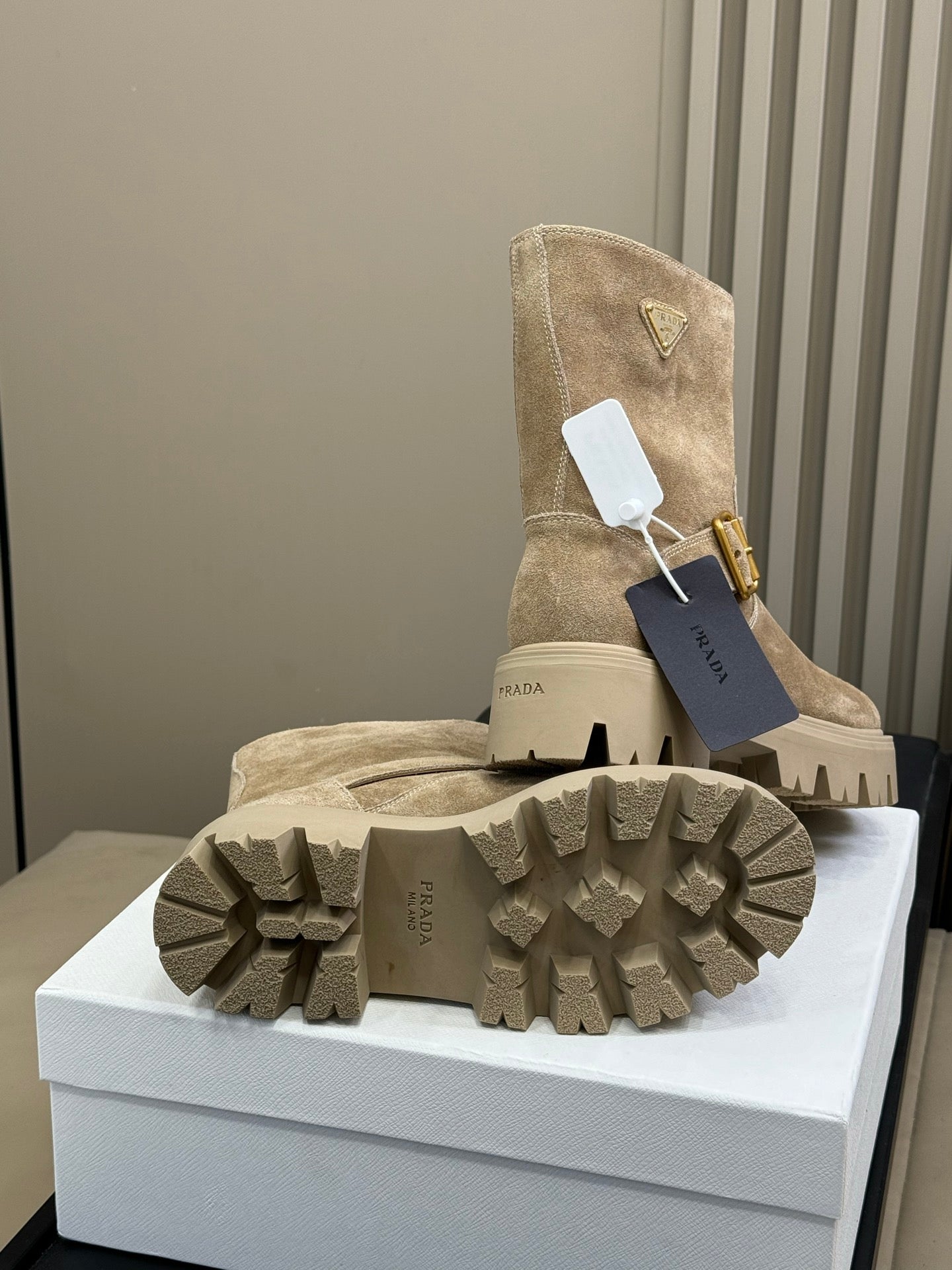 PRADA 25S PLATFORM ANKLE BOOTS IN DARK BEIGE SUEDE WITH GOLD HARDWARE