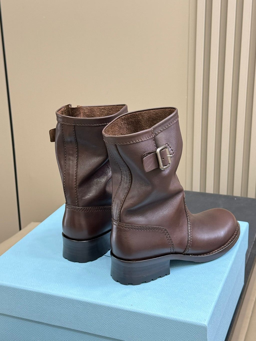 PRADA 25S ANKLE BOOTS IN BROWN CALFSKIN