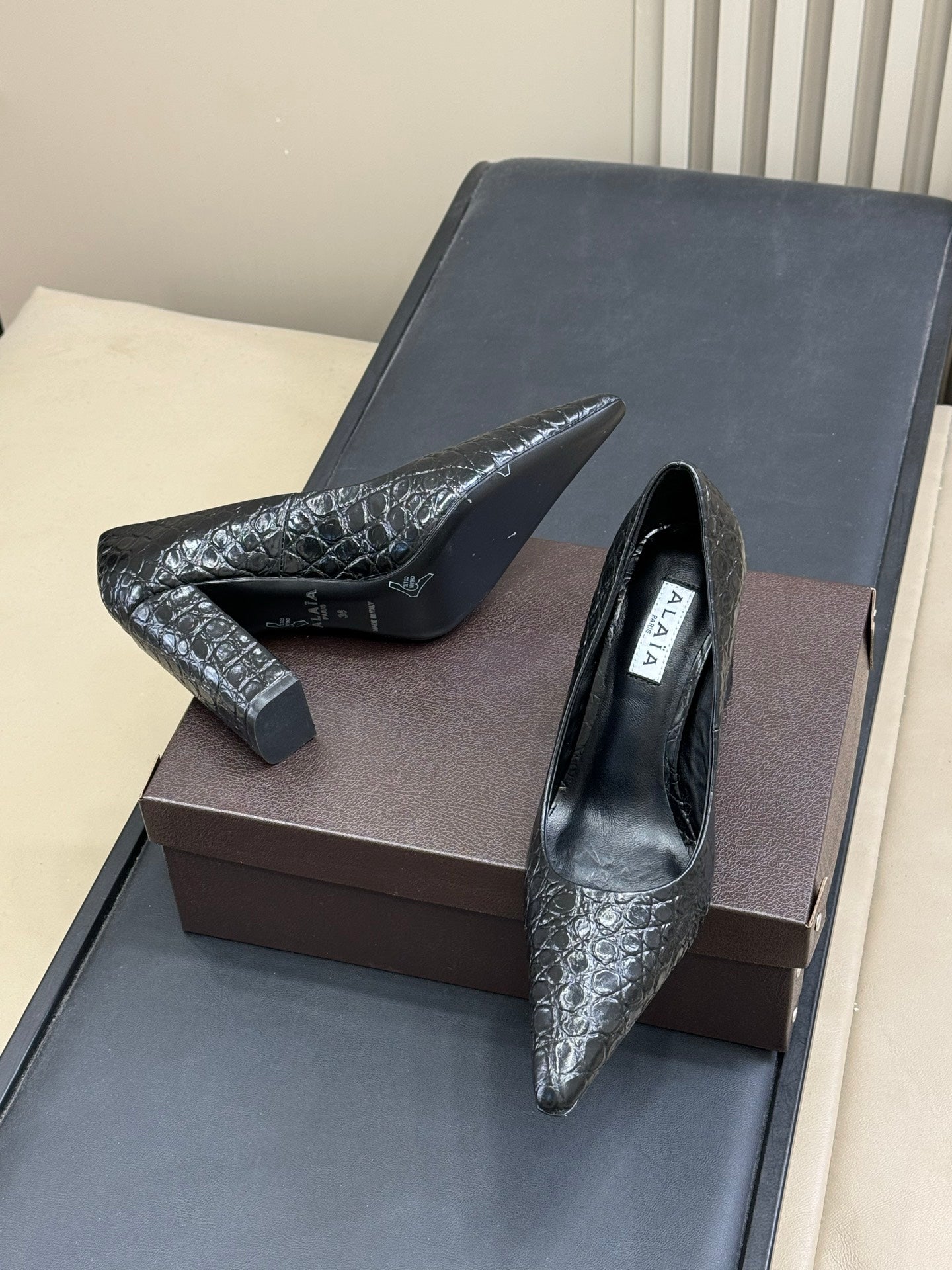 ALAIA 25S POINTY TOE PUMPS 90MM IN BLACK CALFSKIN