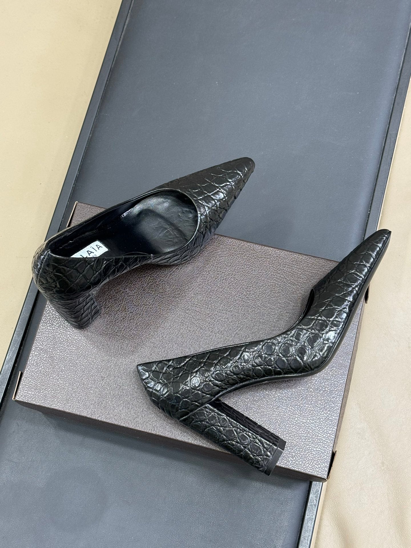 ALAIA 25S POINTY TOE PUMPS 90MM IN BLACK CALFSKIN