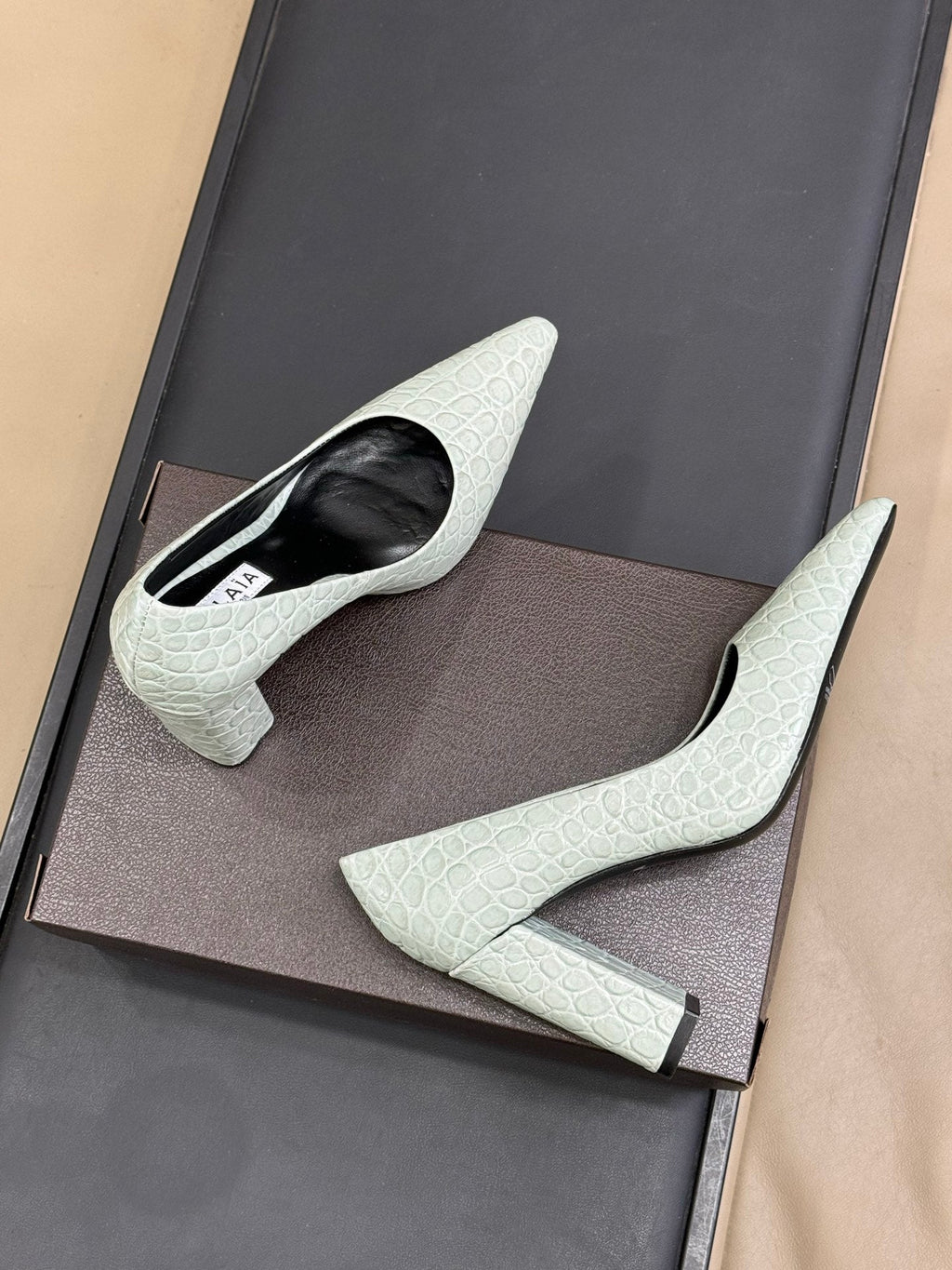ALAIA 25S POINTY TOE PUMPS 90MM IN CELADON GREEN CALFSKIN
