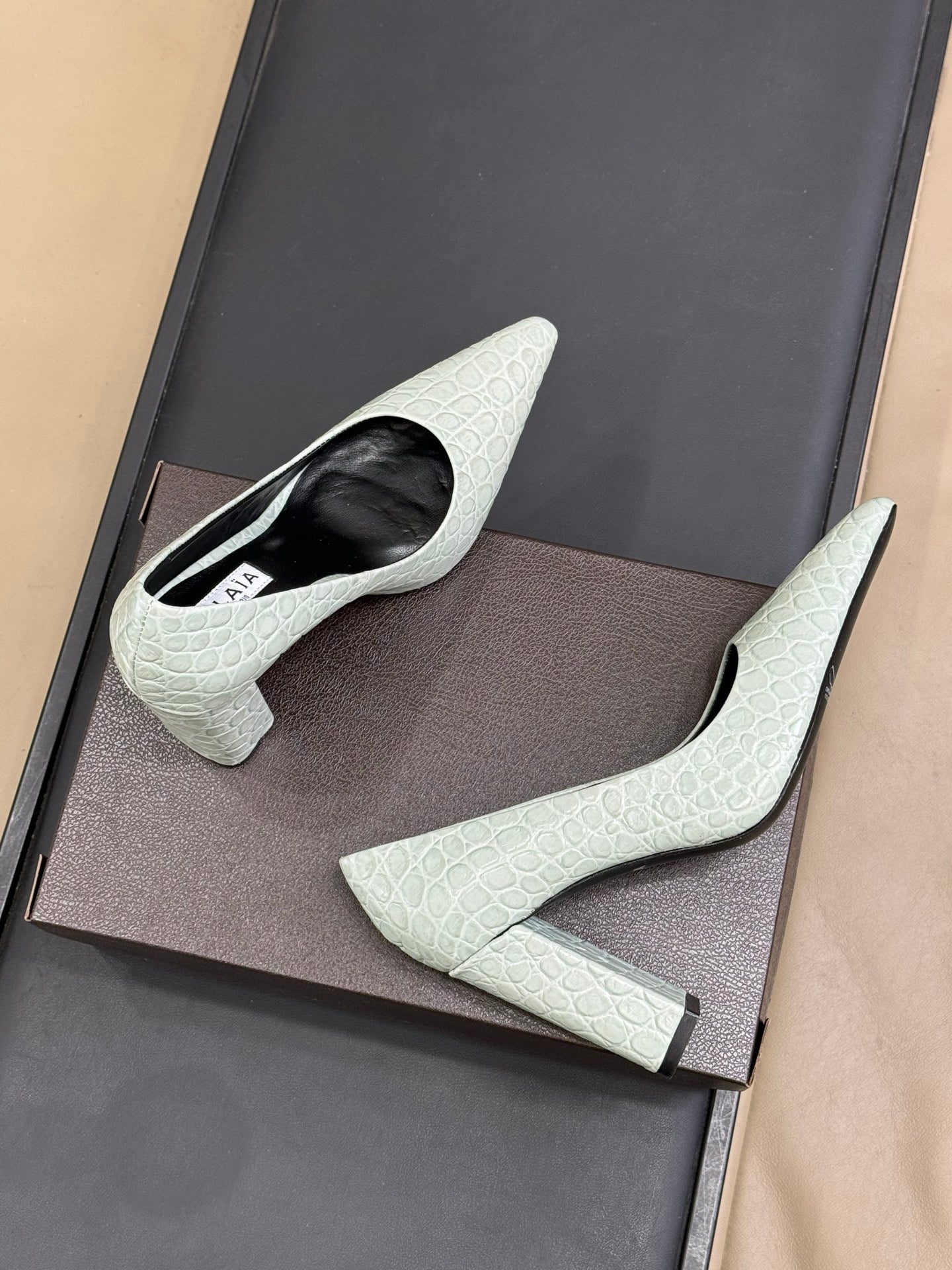 ALAIA 25S POINTY TOE PUMPS 90MM IN CELADON GREEN CALFSKIN