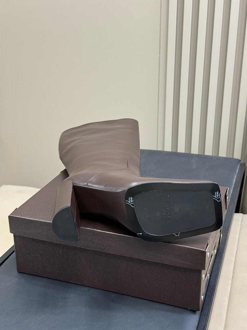 ALAIA 25S KNEE-HIGH SQUARE-TOE BOOTS IN BROWN CALFSKIN