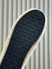 PRADA 25S CLOGS IN BEIGE SHEARLING