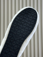 PRADA 25S CLOGS IN WHITE SHEARLING