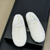 PRADA 25S CLOGS IN WHITE SHEARLING
