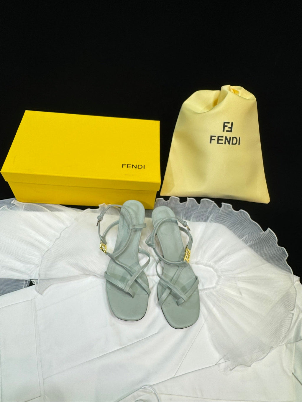 FENDI FFOLD MEDIUM-HEELED 55 MM SANDALS IN ASH GREY LAMBSKIN WITH GOLD HARDWARE