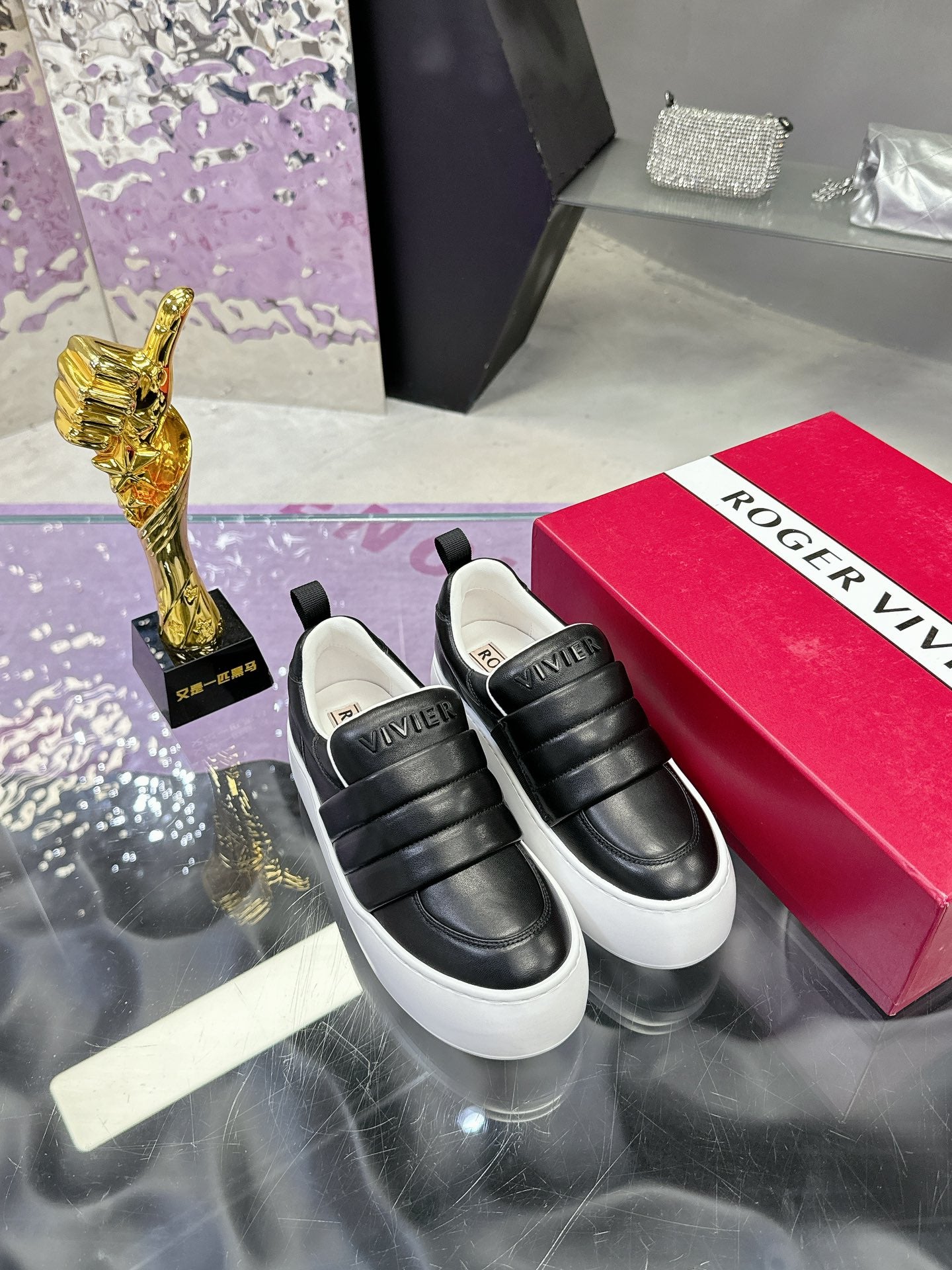 PUFFY LEATHER LOW TOP SNEAKERS IN BLACK LAMBSKIN