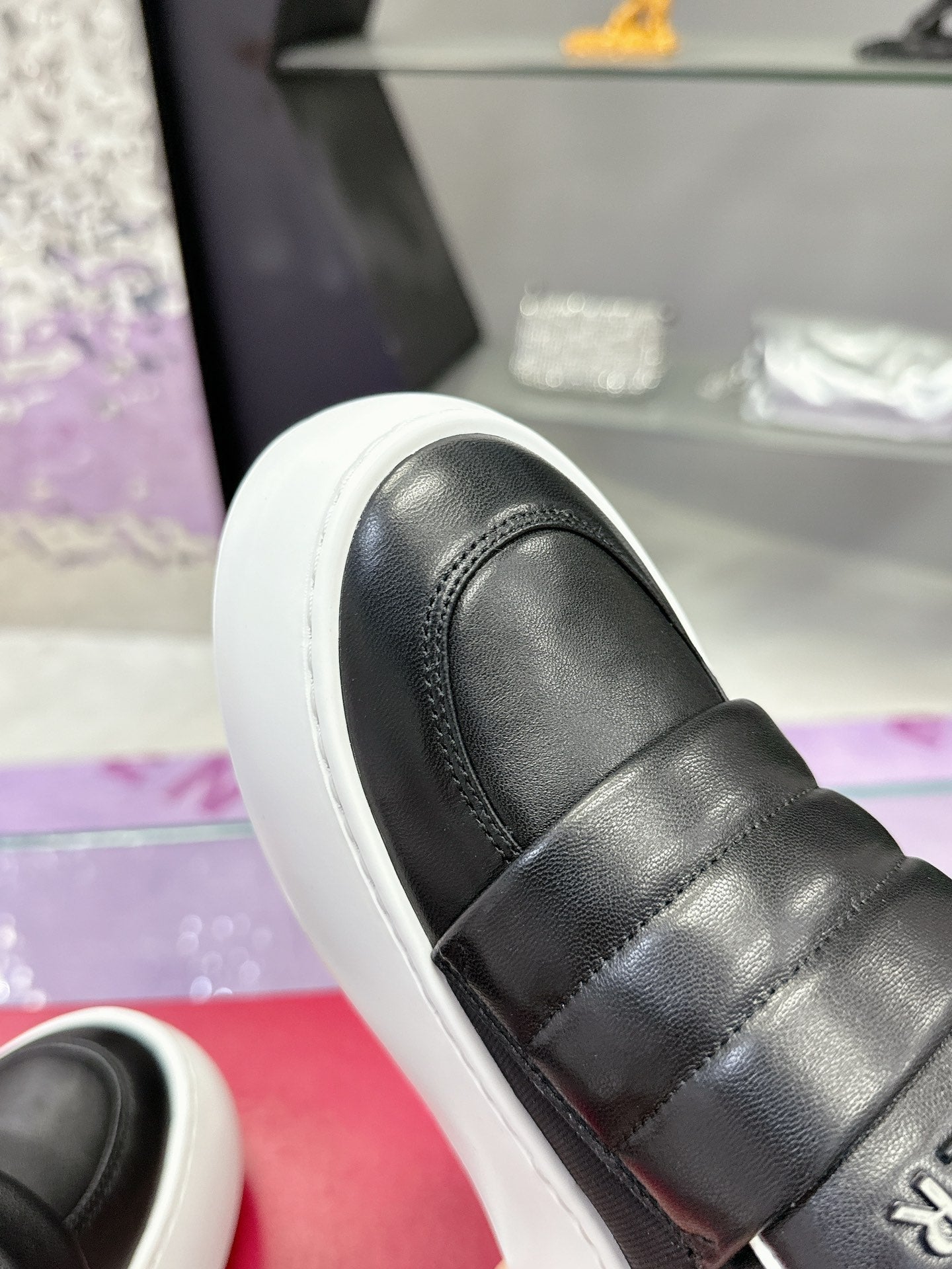 PUFFY LEATHER LOW TOP SNEAKERS IN BLACK LAMBSKIN