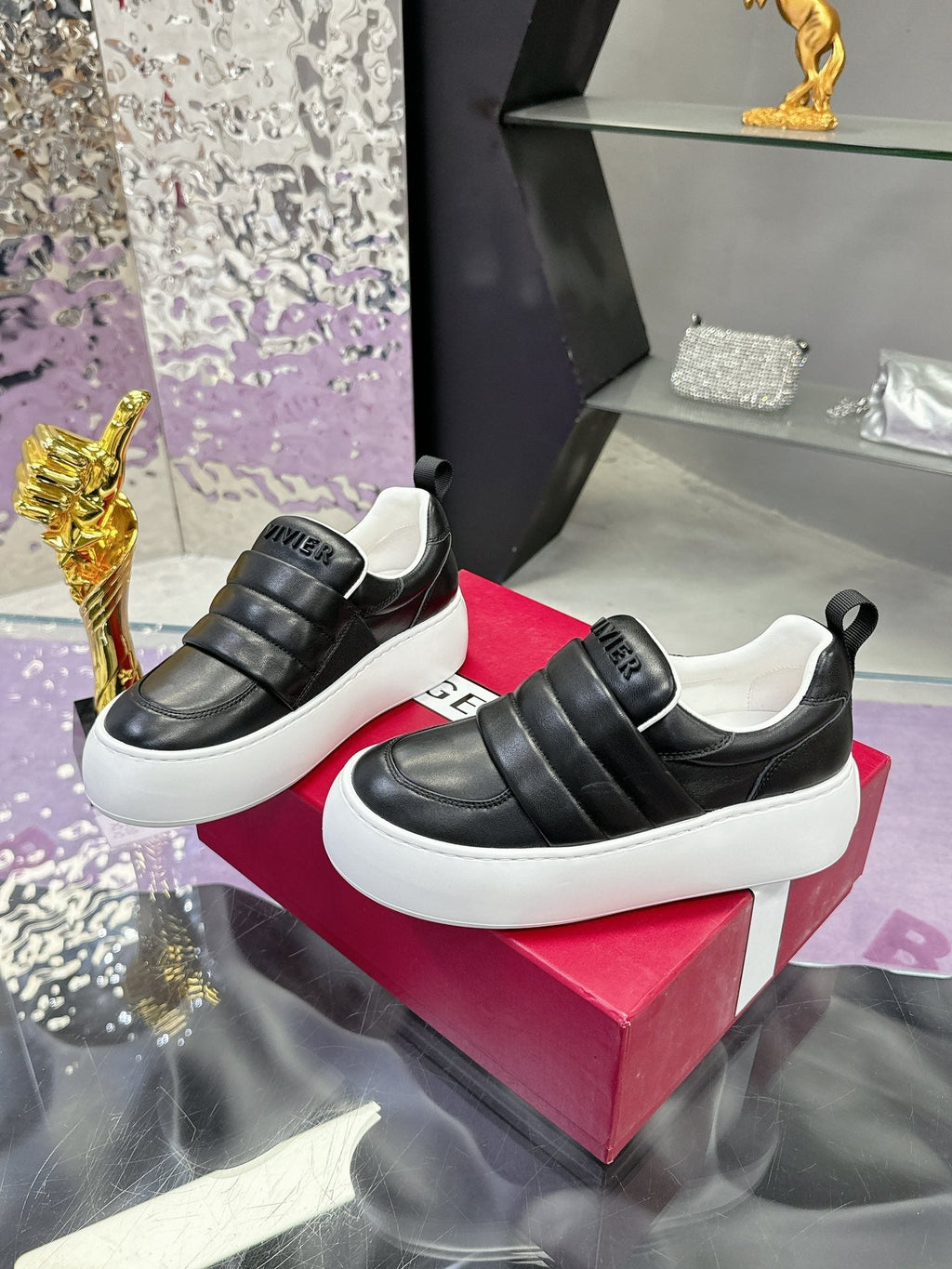 PUFFY LEATHER LOW TOP SNEAKERS IN BLACK LAMBSKIN