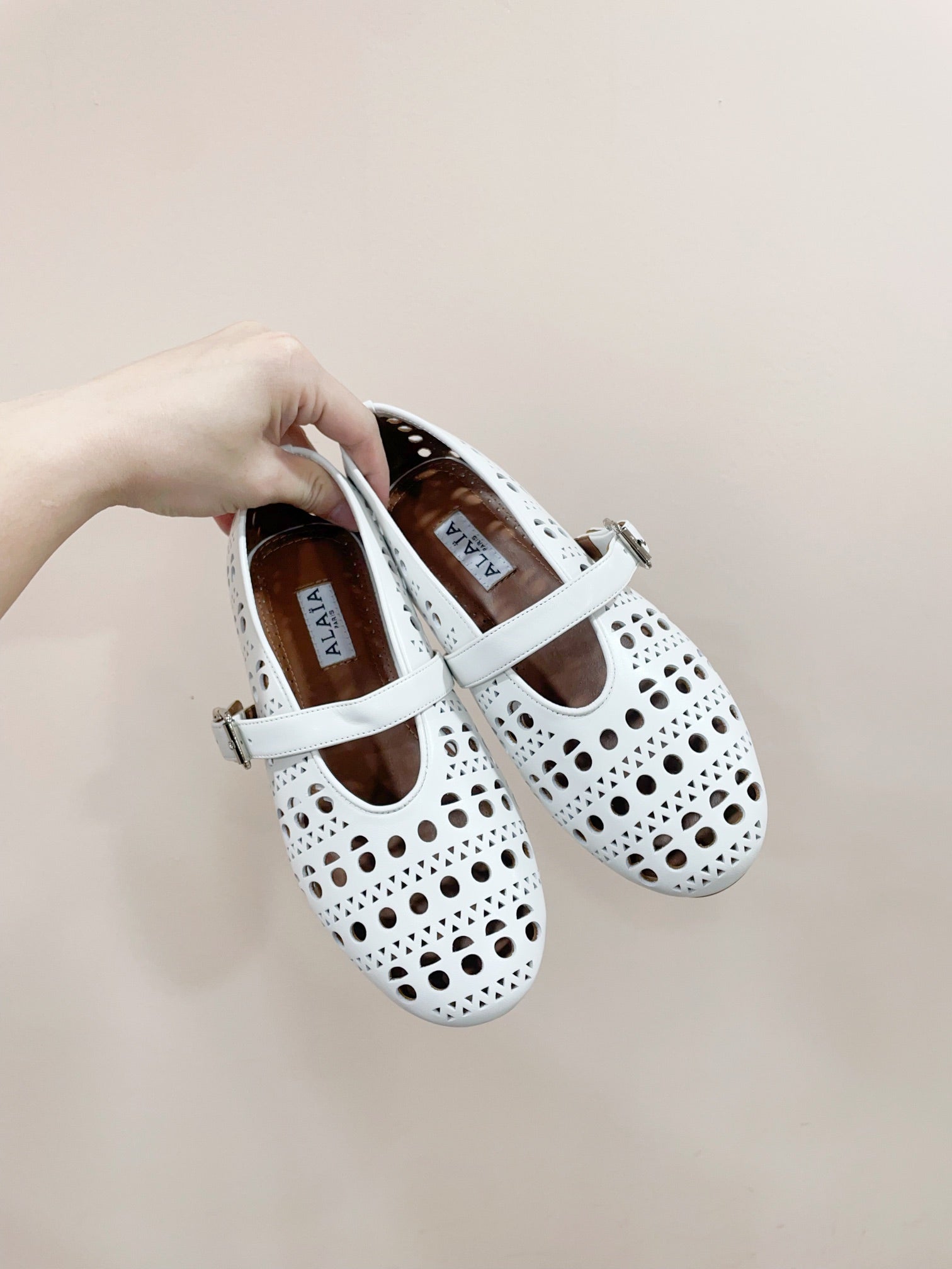 ALAIA HOLLOW BALLET FLAT IN WHITE LAMBSKIN