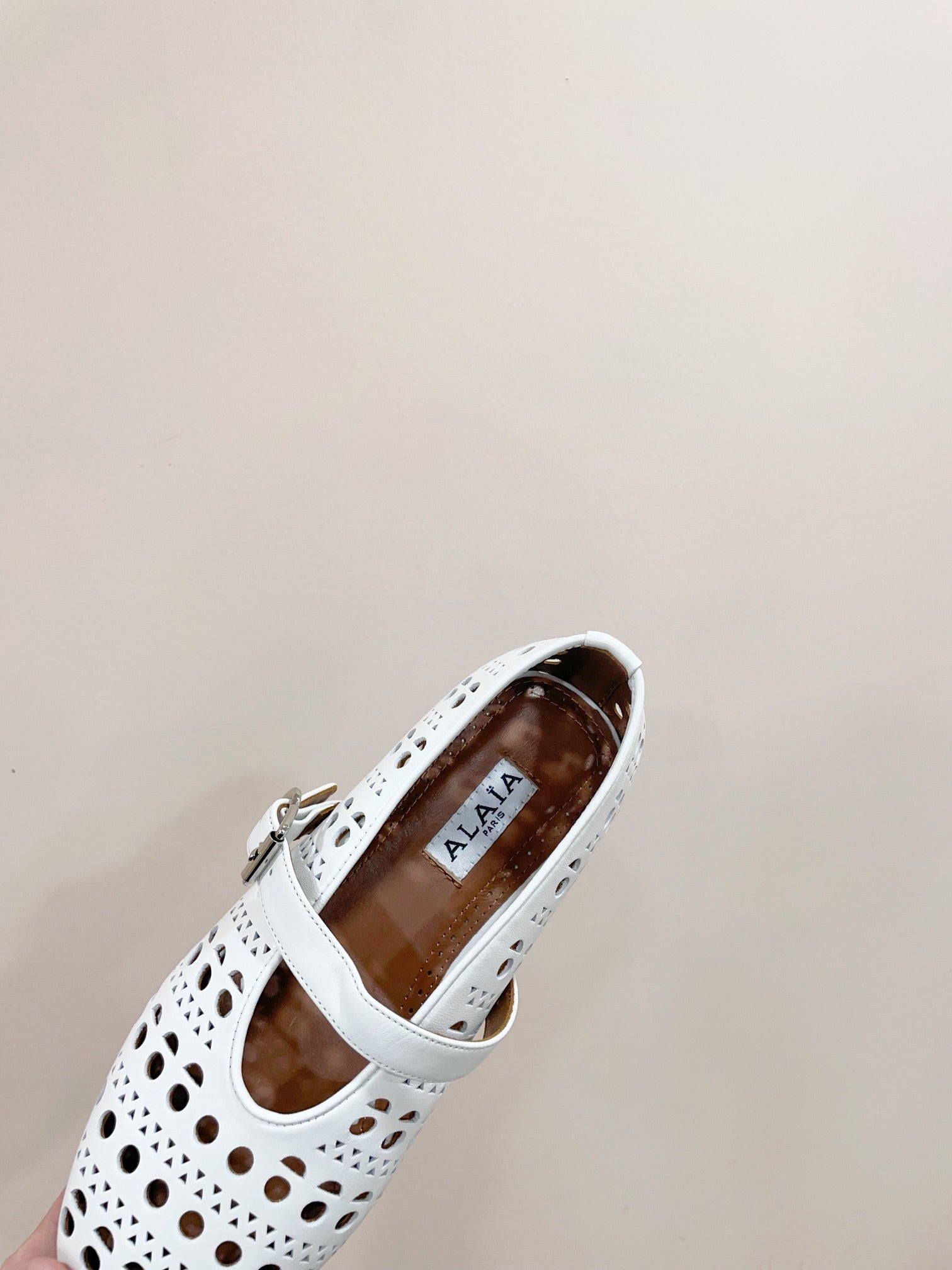 ALAIA HOLLOW BALLET FLAT IN WHITE LAMBSKIN