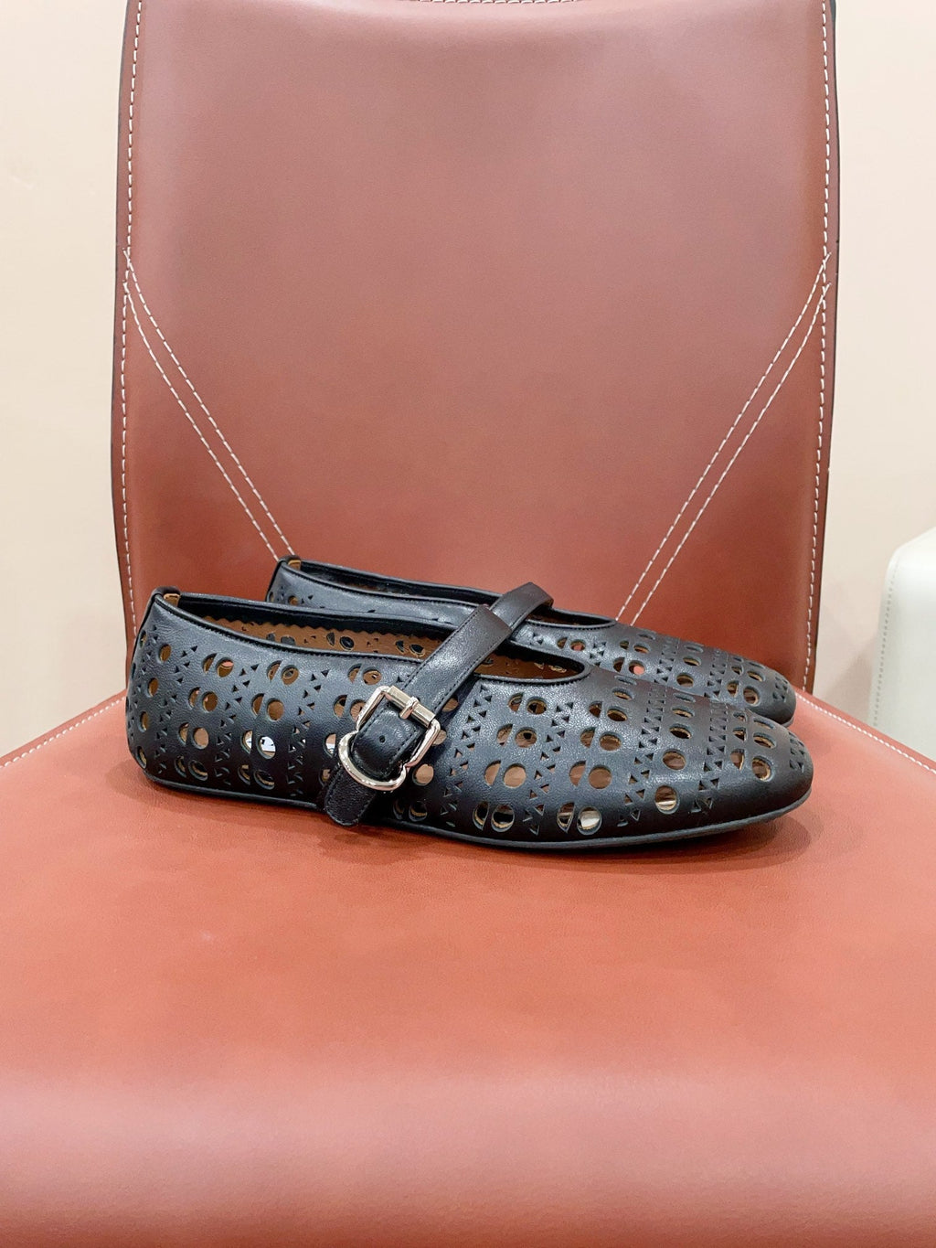 ALAIA HOLLOW BALLET FLAT IN BLACK LAMBSKIN