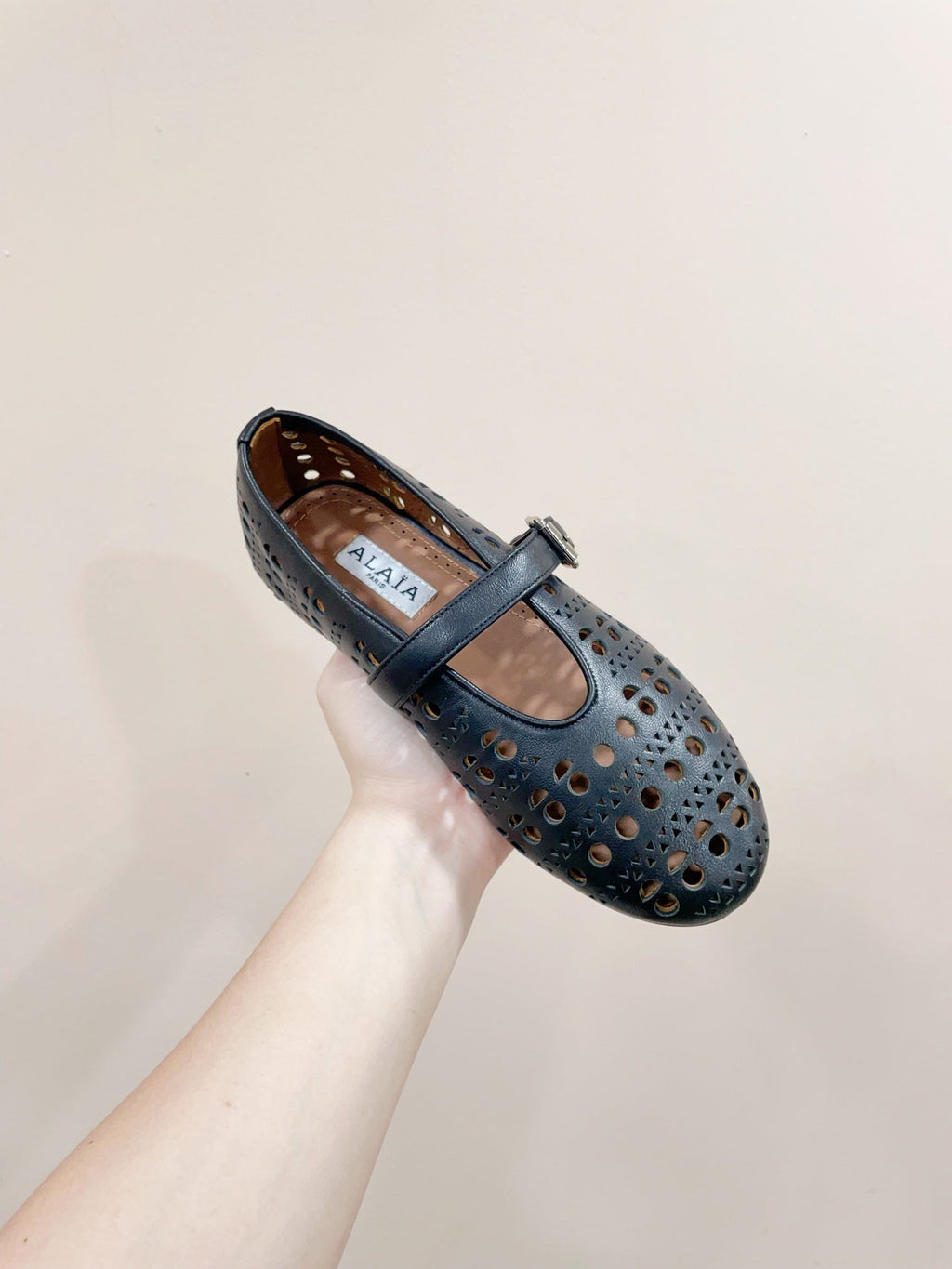 ALAIA HOLLOW BALLET FLAT IN BLACK LAMBSKIN