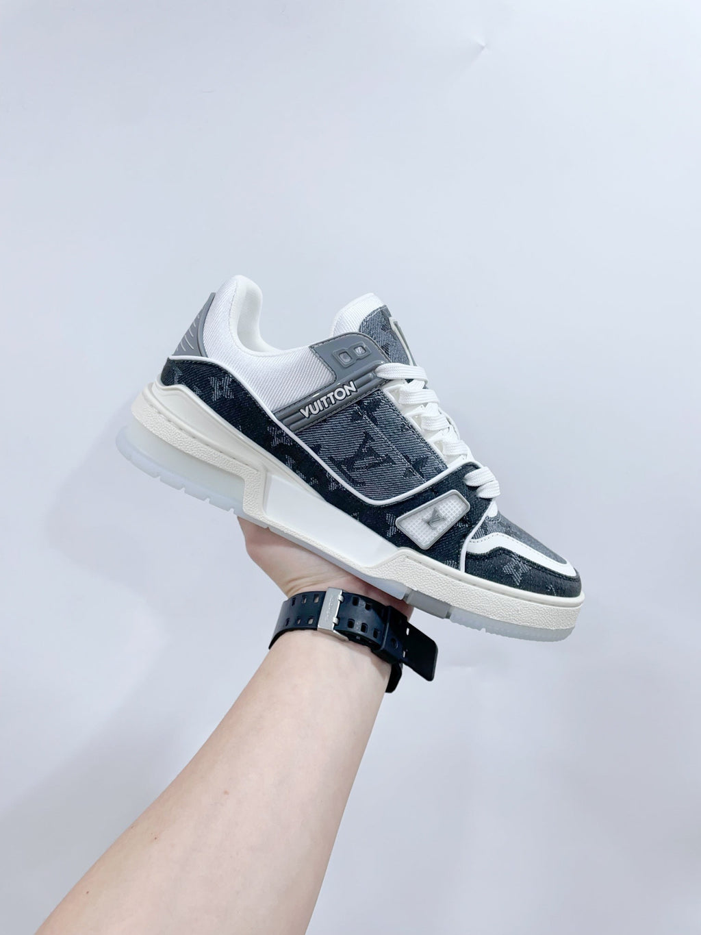 LV TRAINER SNEAKER IN DOVE GRAY MONOGRAM DENIM