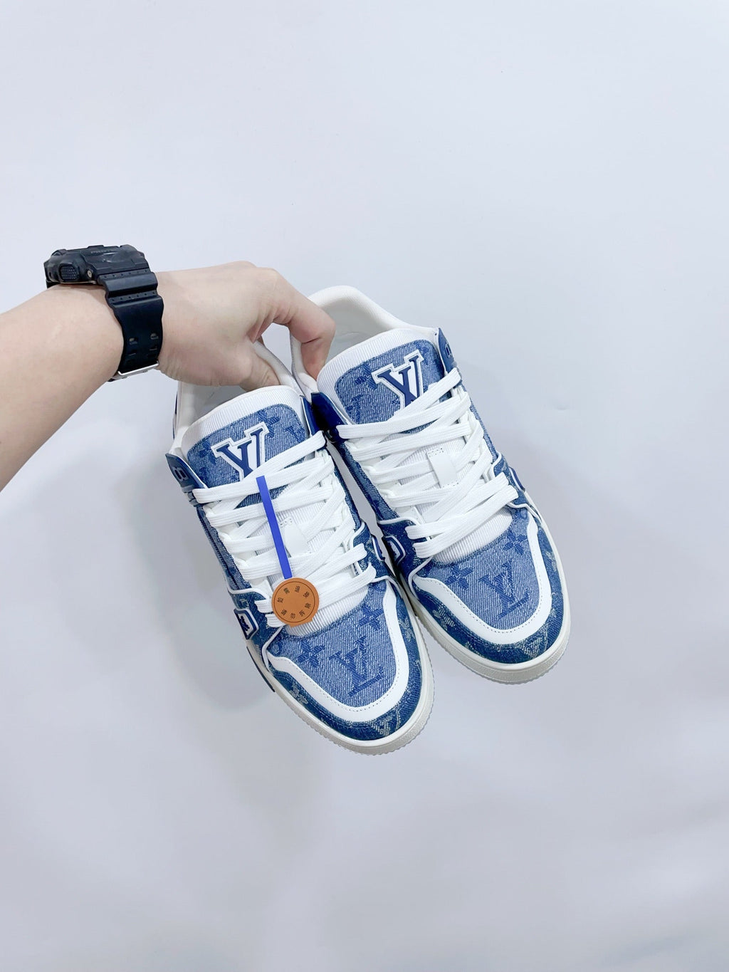 LV TRAINER SNEAKER IN CERULEAN BLUE MONOGRAM DENIM