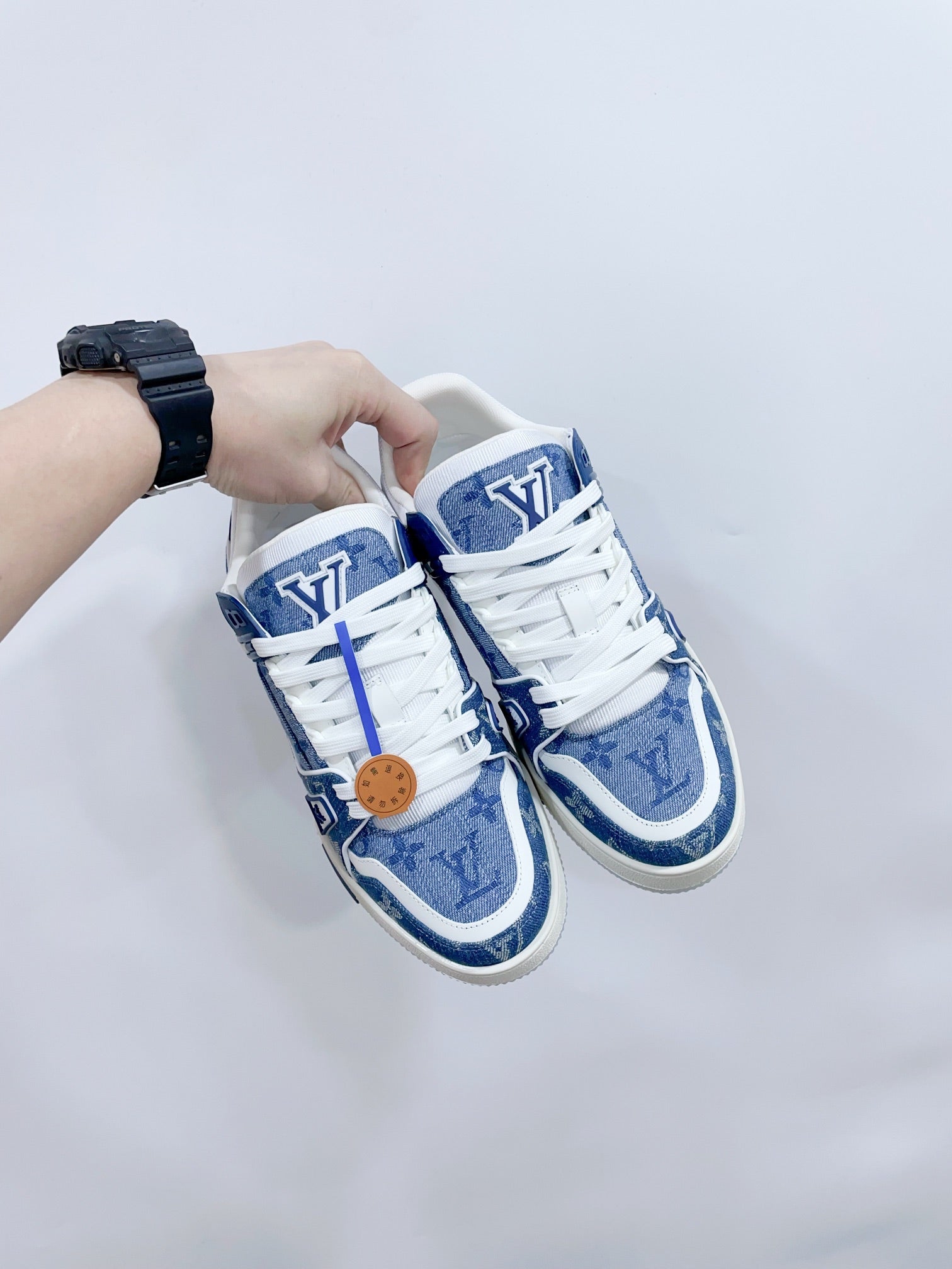 LV TRAINER SNEAKER IN CERULEAN BLUE MONOGRAM DENIM