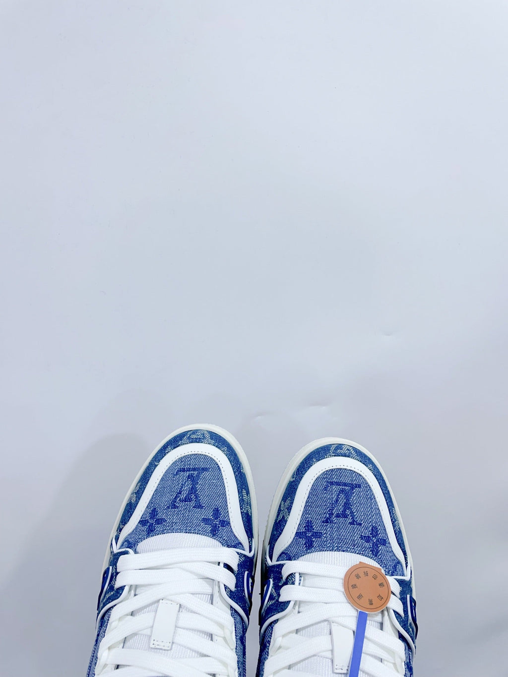 LV TRAINER SNEAKER IN CERULEAN BLUE MONOGRAM DENIM