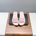 ALAIA FLAT SANDALS WITH PERFORATED STRAPS 25S IN LIGHT PINK SUEDE