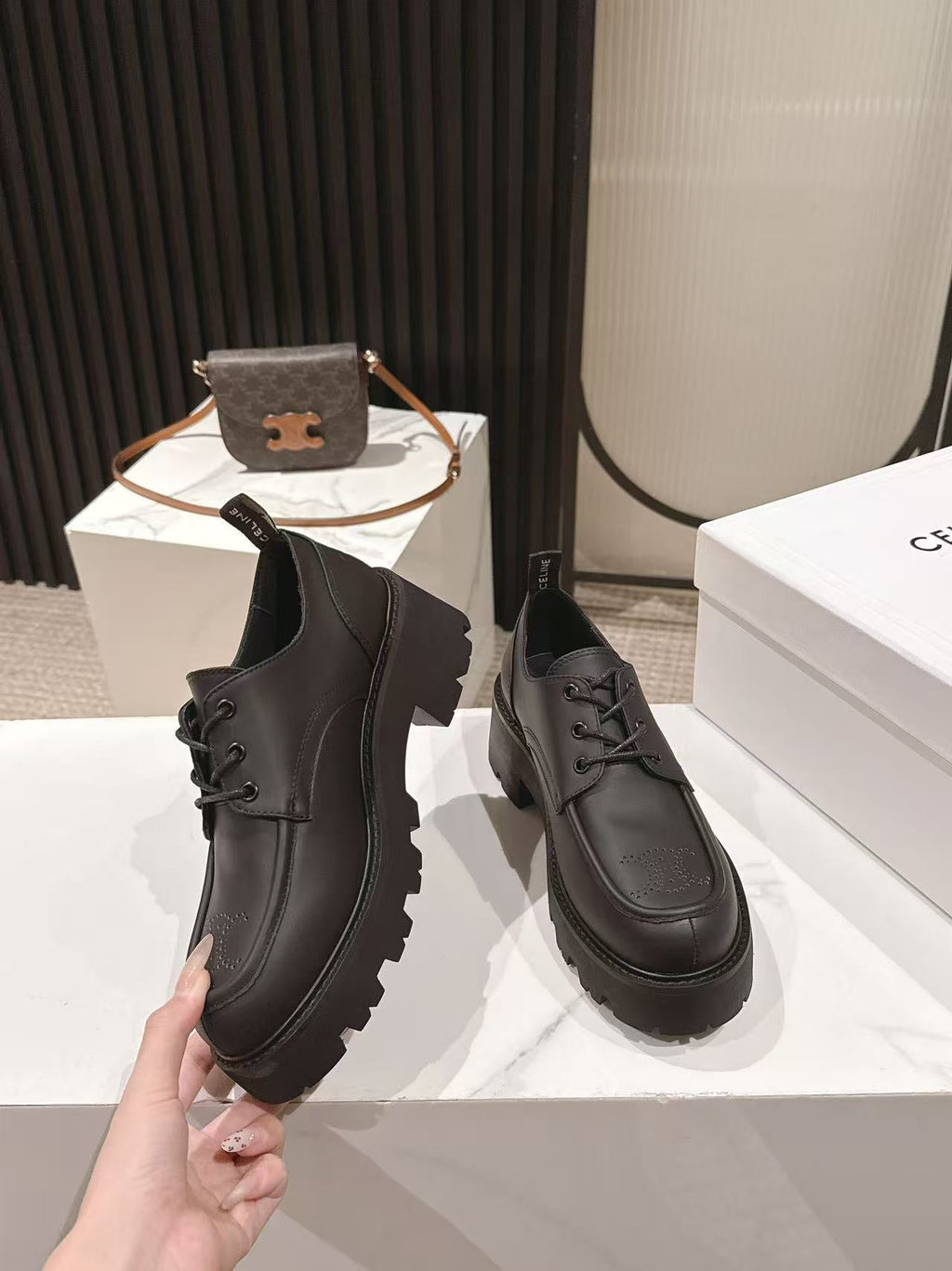 CELINE 25S THICK SOLED LOAFERS 50MM IN BLACK CALFSKIN