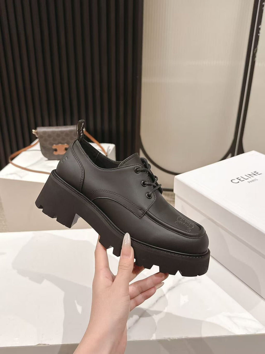 CELINE 25S THICK SOLED LOAFERS 50MM IN BLACK CALFSKIN