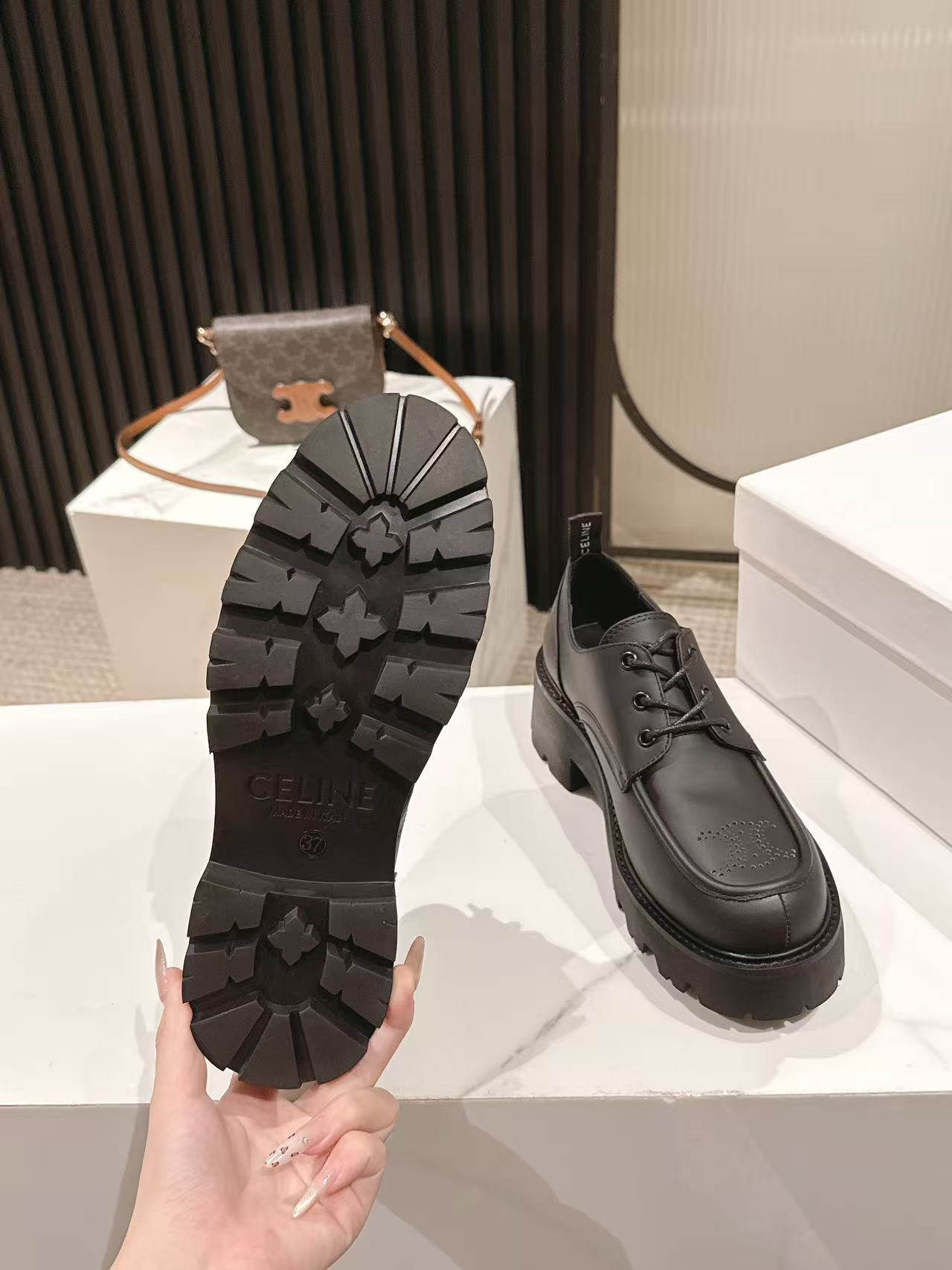 CELINE 25S THICK SOLED LOAFERS 50MM IN BLACK CALFSKIN