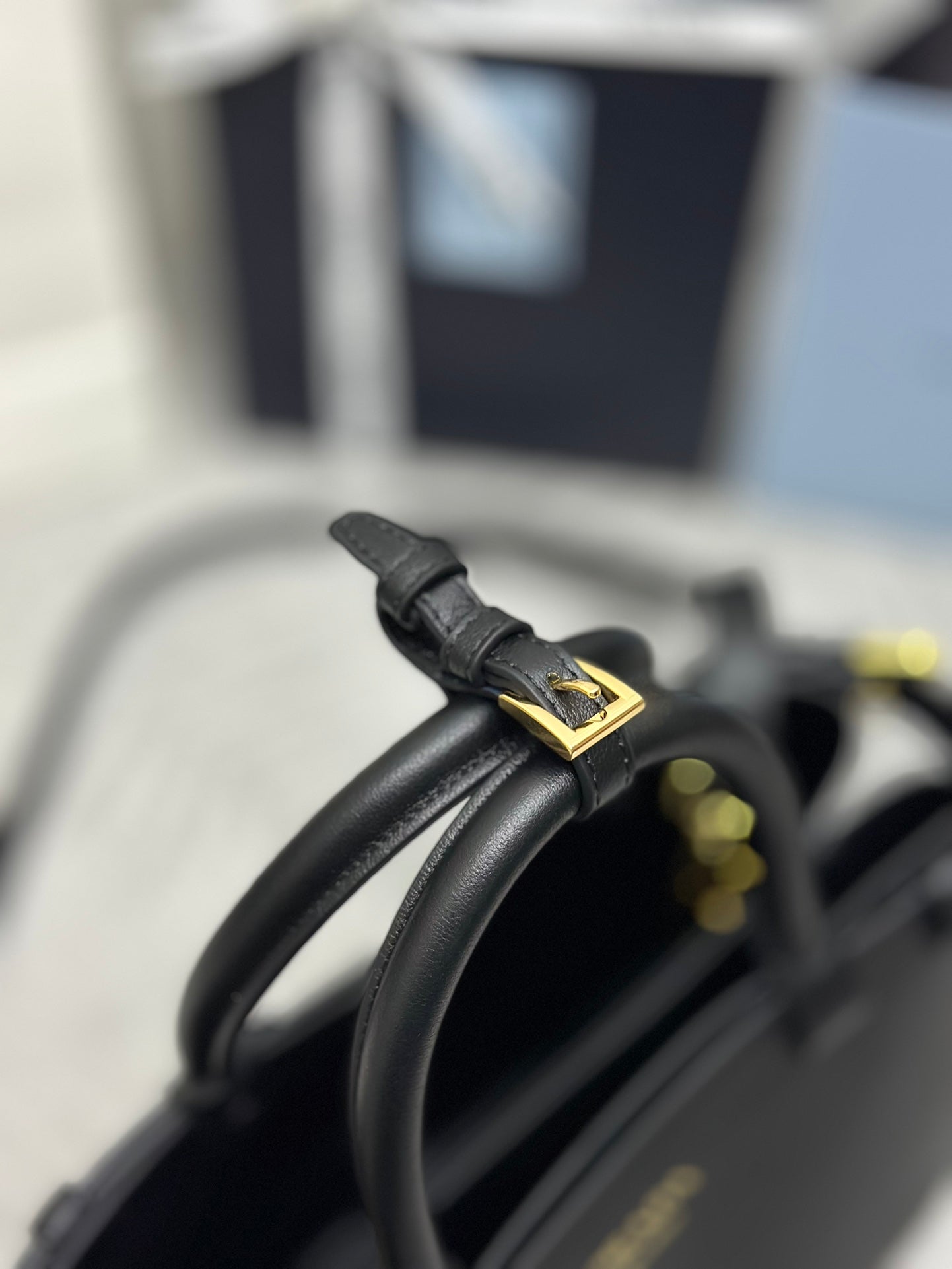 PRADA 25S BUCKLE MEDIUM HANDBAG 28 IN BLACK CALFSKIN GOLD HARDWARE