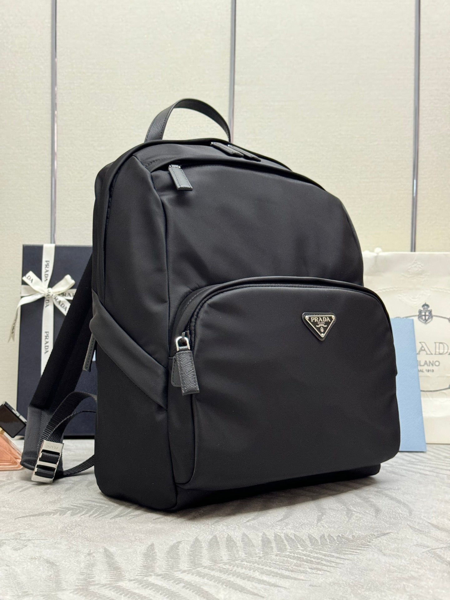 PRADA 25S BACKPACK 39 IN BLACK RE-NYLON AND SAFFIANO CALFSKIN