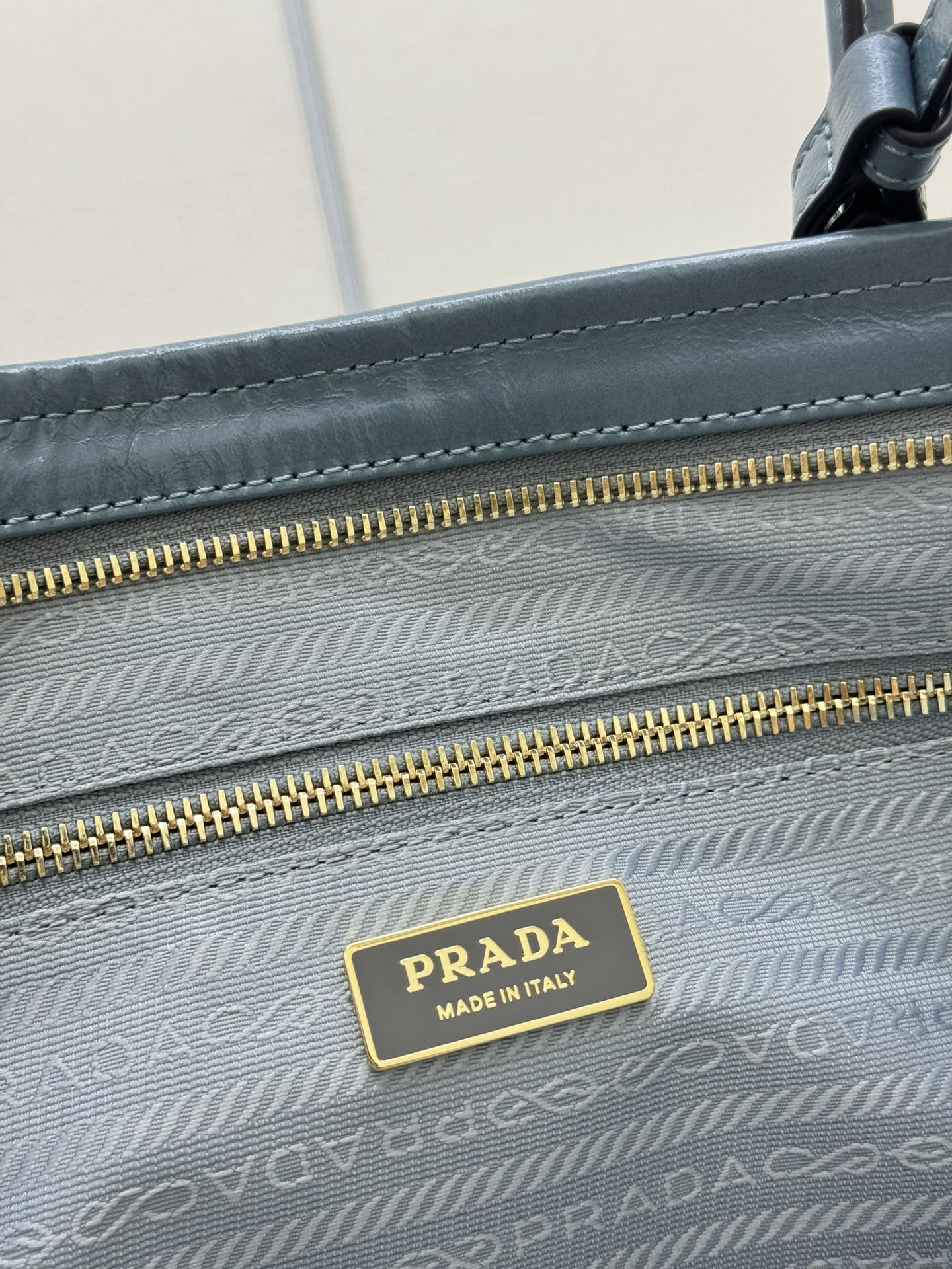 PRADA 25S LUX SOFT BAG 42 IN BLUE GLOSSY CALFSKIN GOLD HARDWRE