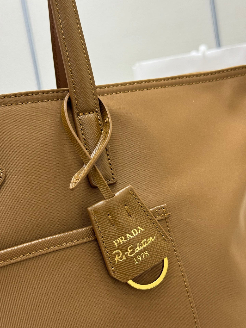 PRADA 25S RE-EDITION 1978 MEDIUM 35 IN DARK CARAMEL NYLON AND SAFFIANO CALFSKIN