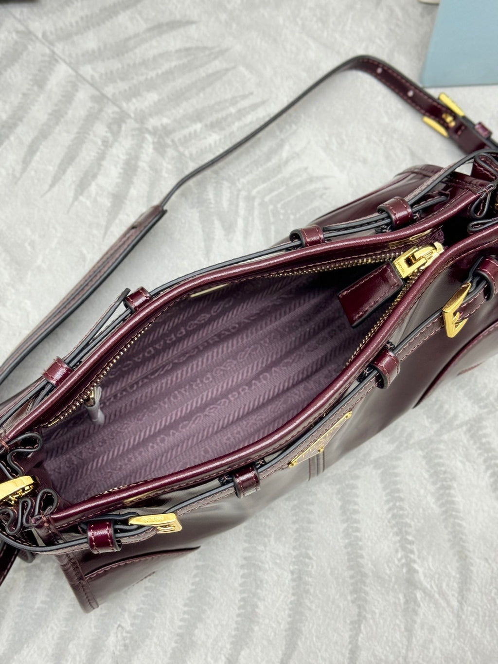 PRADA 25S BONNIE SMALL SHOULDER BAG 26 IN BURGUNDY GLOSSY CALFSKIN GOLD HARDWRE