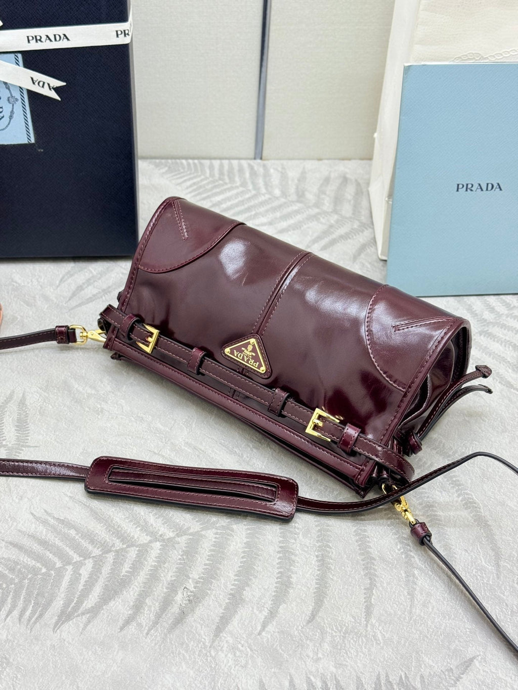 PRADA 25S BONNIE SMALL SHOULDER BAG 26 IN BURGUNDY GLOSSY CALFSKIN GOLD HARDWRE