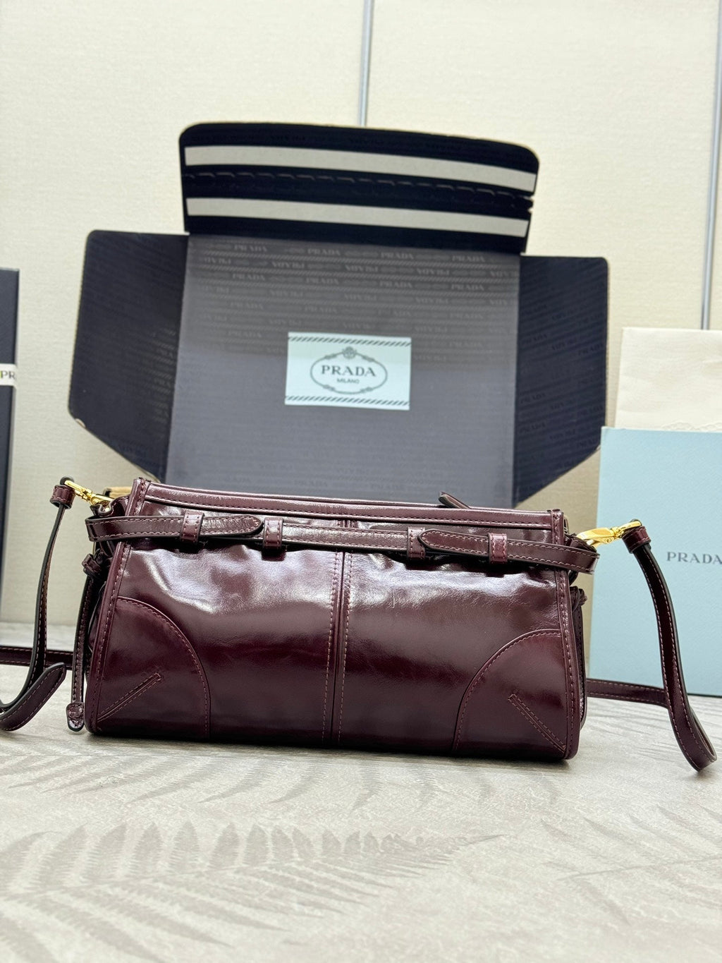 PRADA 25S BONNIE SMALL SHOULDER BAG 26 IN BURGUNDY GLOSSY CALFSKIN GOLD HARDWARE