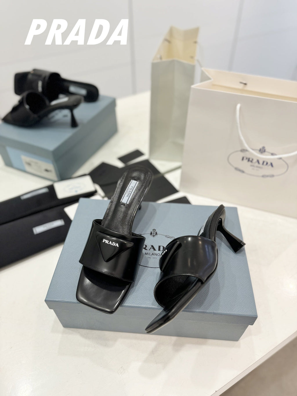 PRA BRUSHED LEATHER HEELED SLIDES BLACK