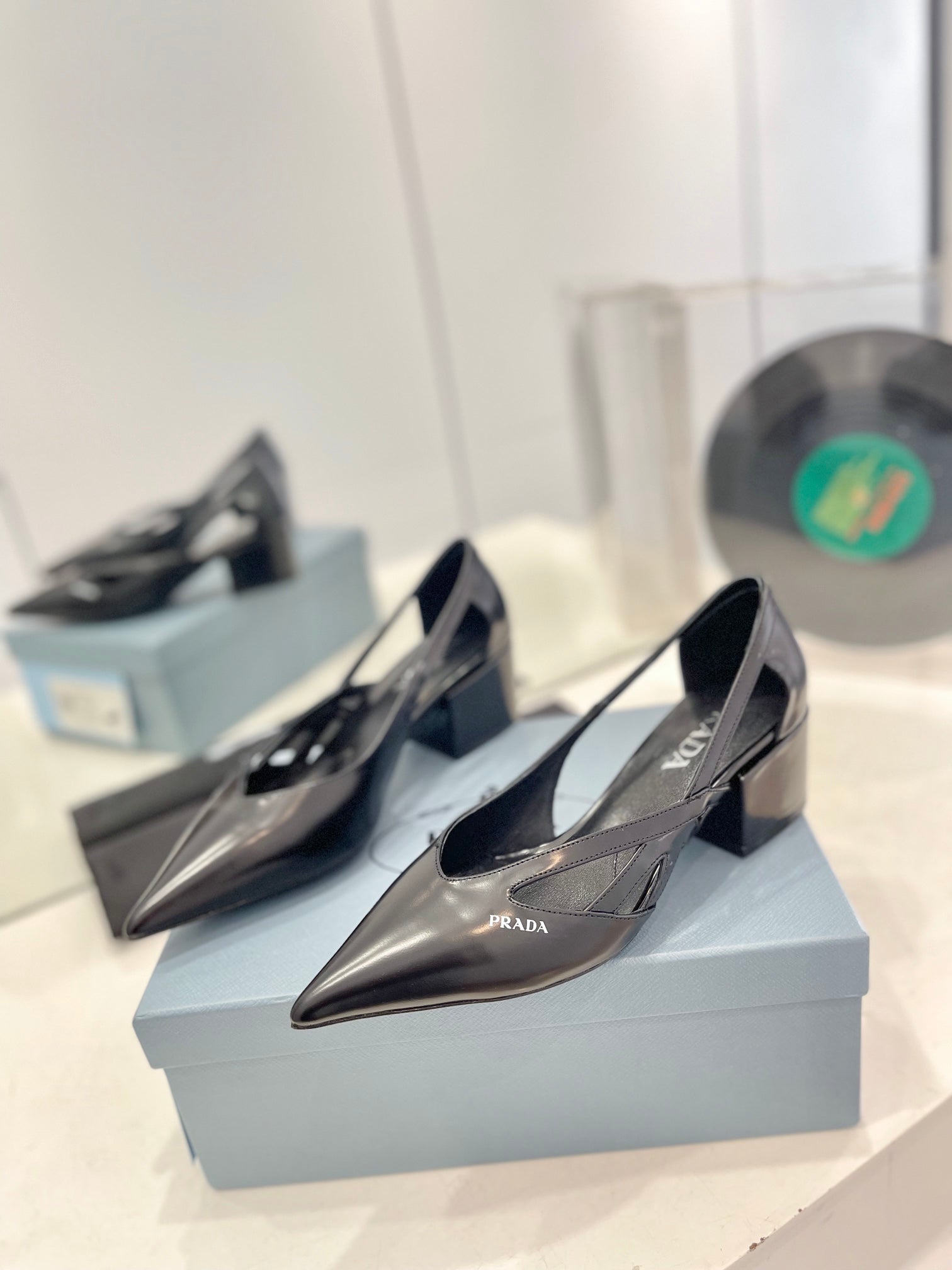 PRA STRAP CUT-OUT PUMPS BLACK CALFSKIN