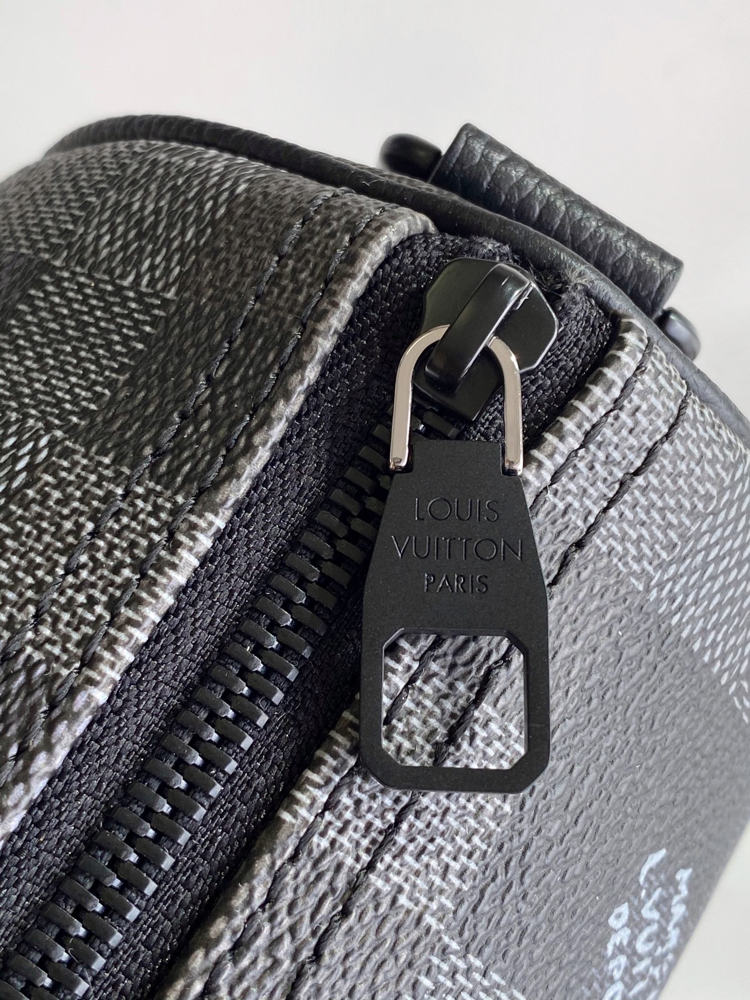 LV 25S KEEPALL BANDOULIÈRE 25 BAG IN DAMOFLAGE BLACK CALFSKIN