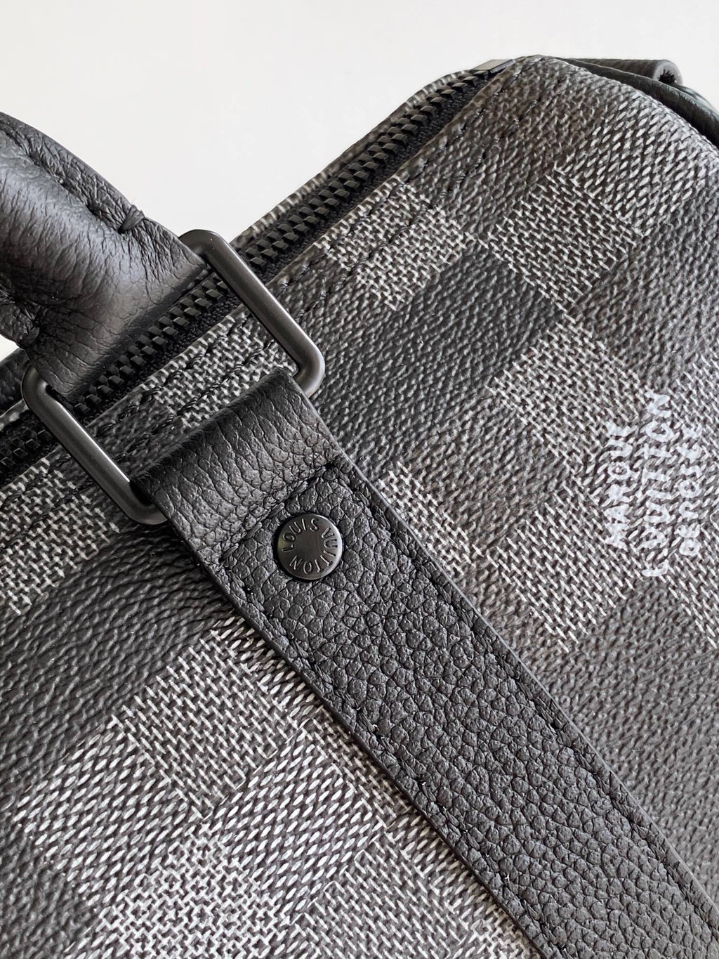 LV 25S KEEPALL BANDOULIÈRE 25 BAG IN DAMOFLAGE BLACK CALFSKIN