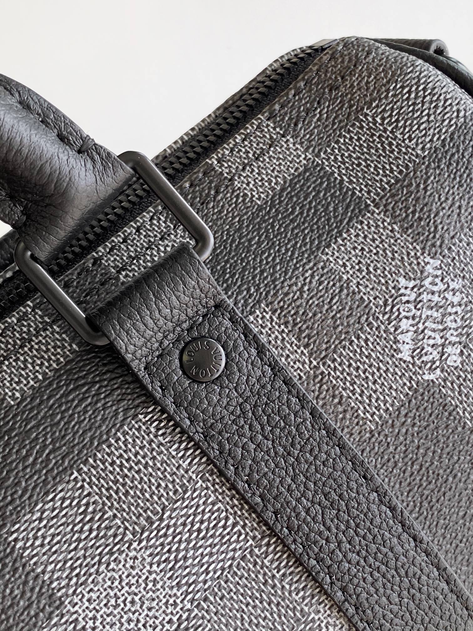 LV 25S KEEPALL BANDOULIÈRE 25 BAG IN DAMOFLAGE BLACK CALFSKIN