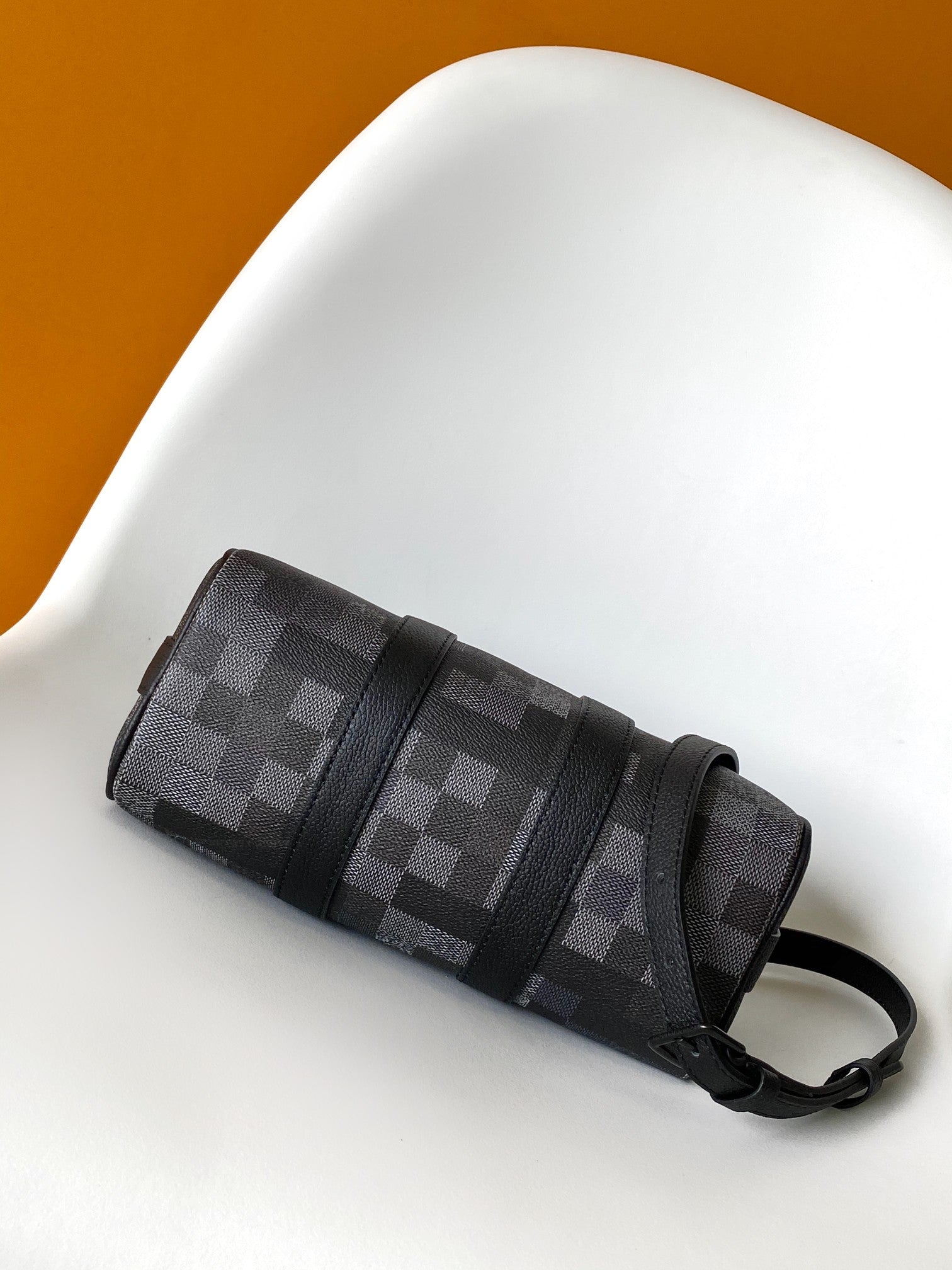 LV 25S KEEPALL BANDOULIÈRE 25 BAG IN DAMOFLAGE BLACK CALFSKIN