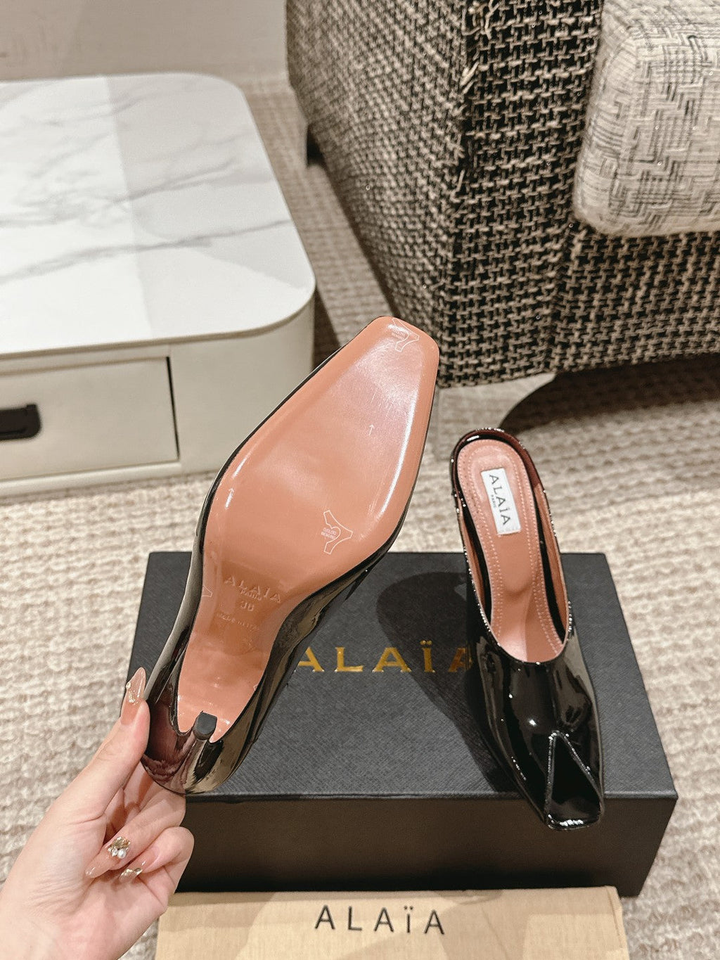 ALAIA SPIKE JEWEL MULES IN BLACK GLOSSY CALFSKIN