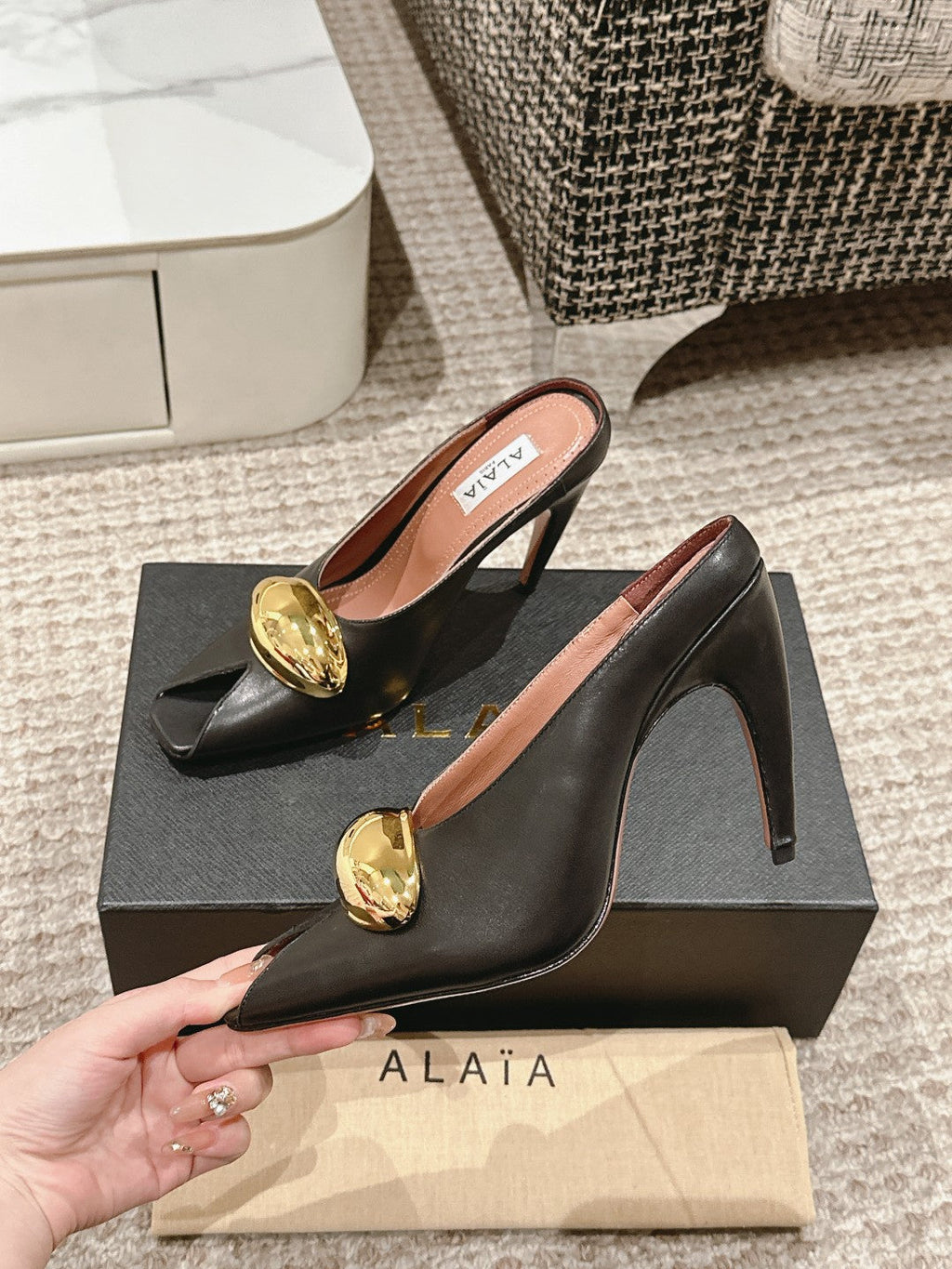 ALAIA SPIKE JEWEL MULES IN BLACK CALFSKIN WITH GOLD HARDWARE