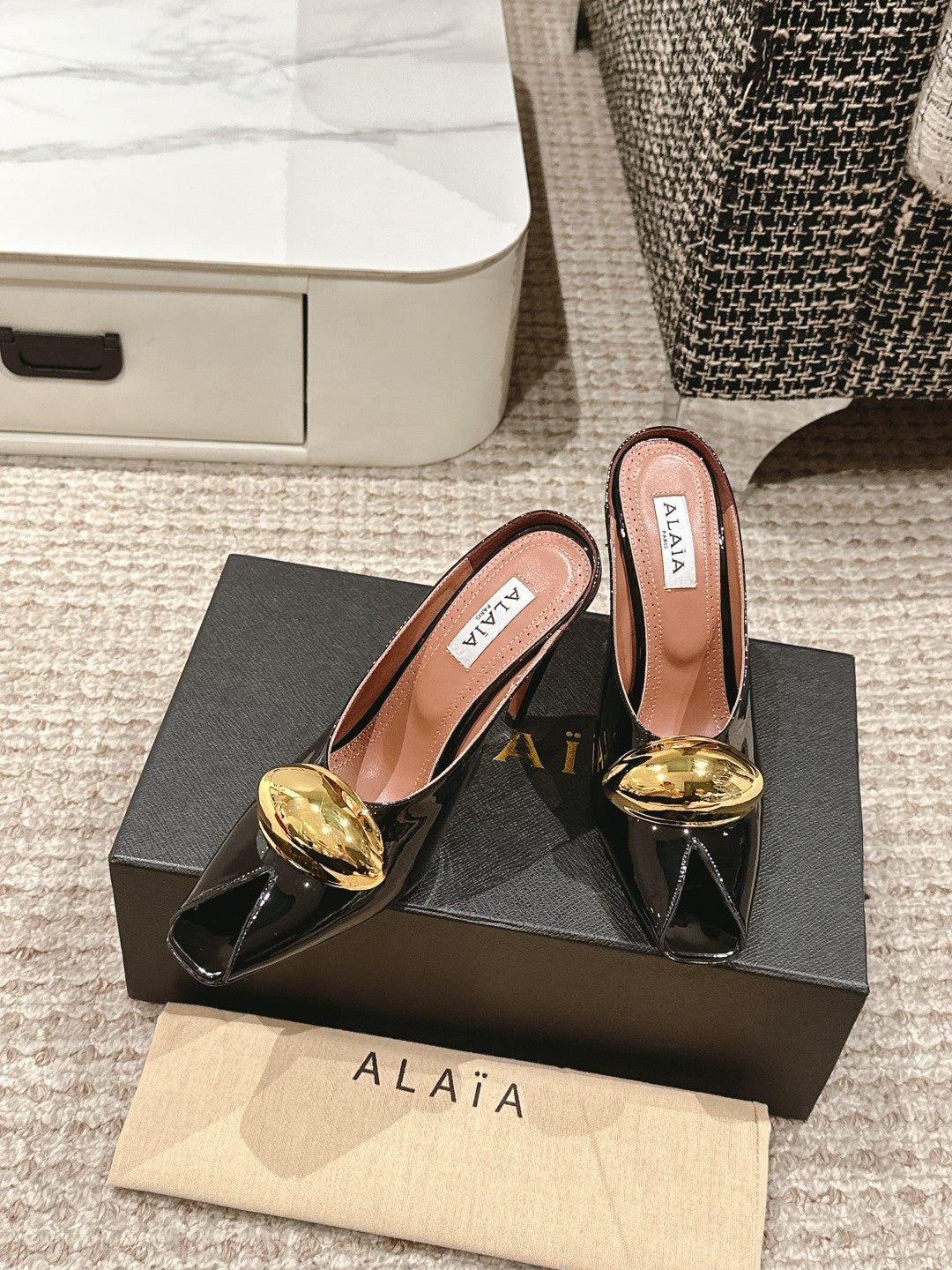 ALAIA SPIKE JEWEL MULES IN BLACK GLOSSY CALFSKIN WITH GOLD HARDWARE