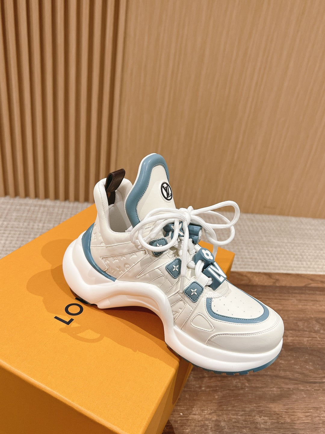 LV ARCHLIGHT SNEAKER IN WHITE MIX SKY BLUE EMBOSSED CALFSKIN